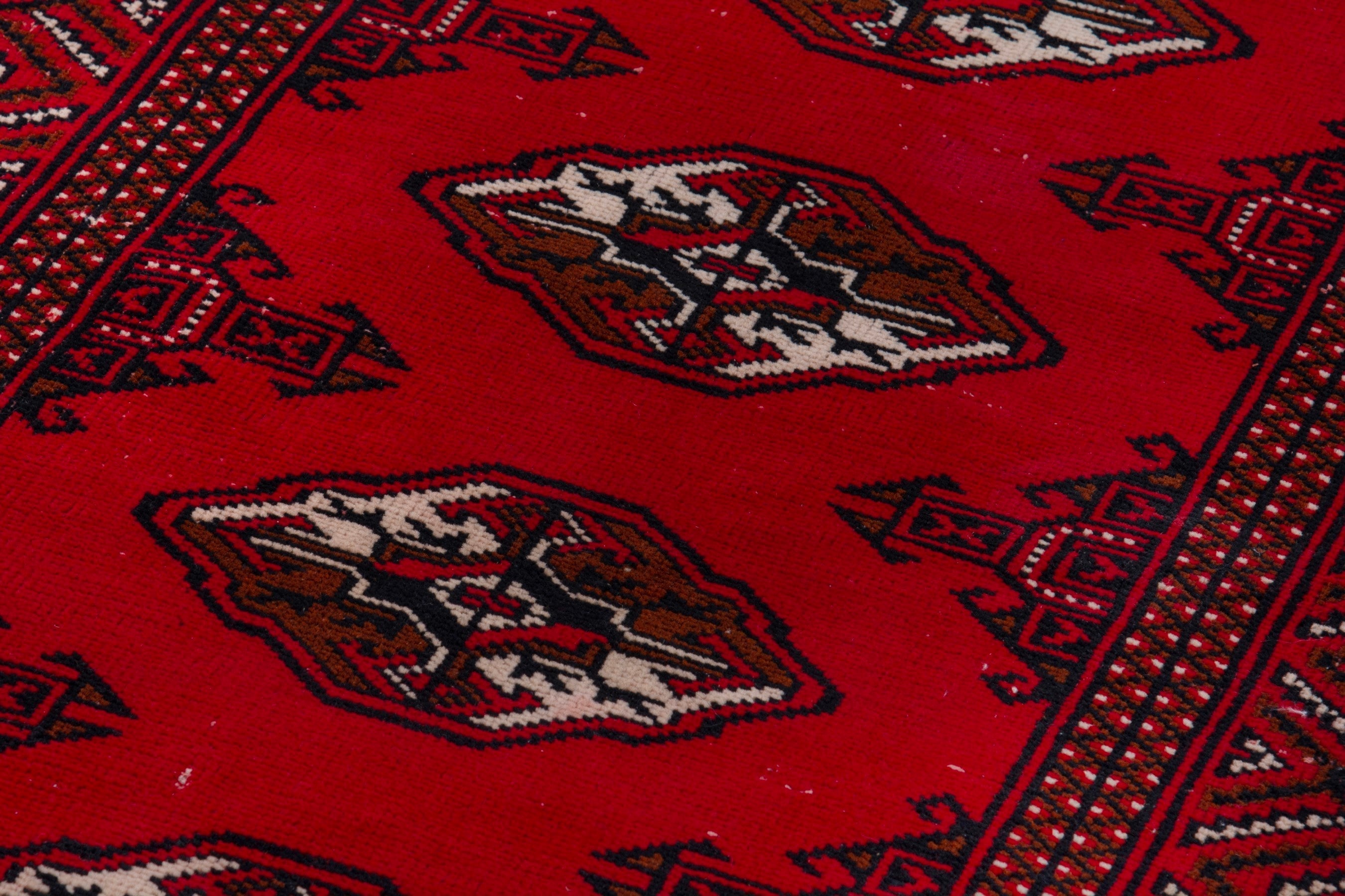 Persian Torkaman accent rug in deep red and burgundy, view 9 of 17