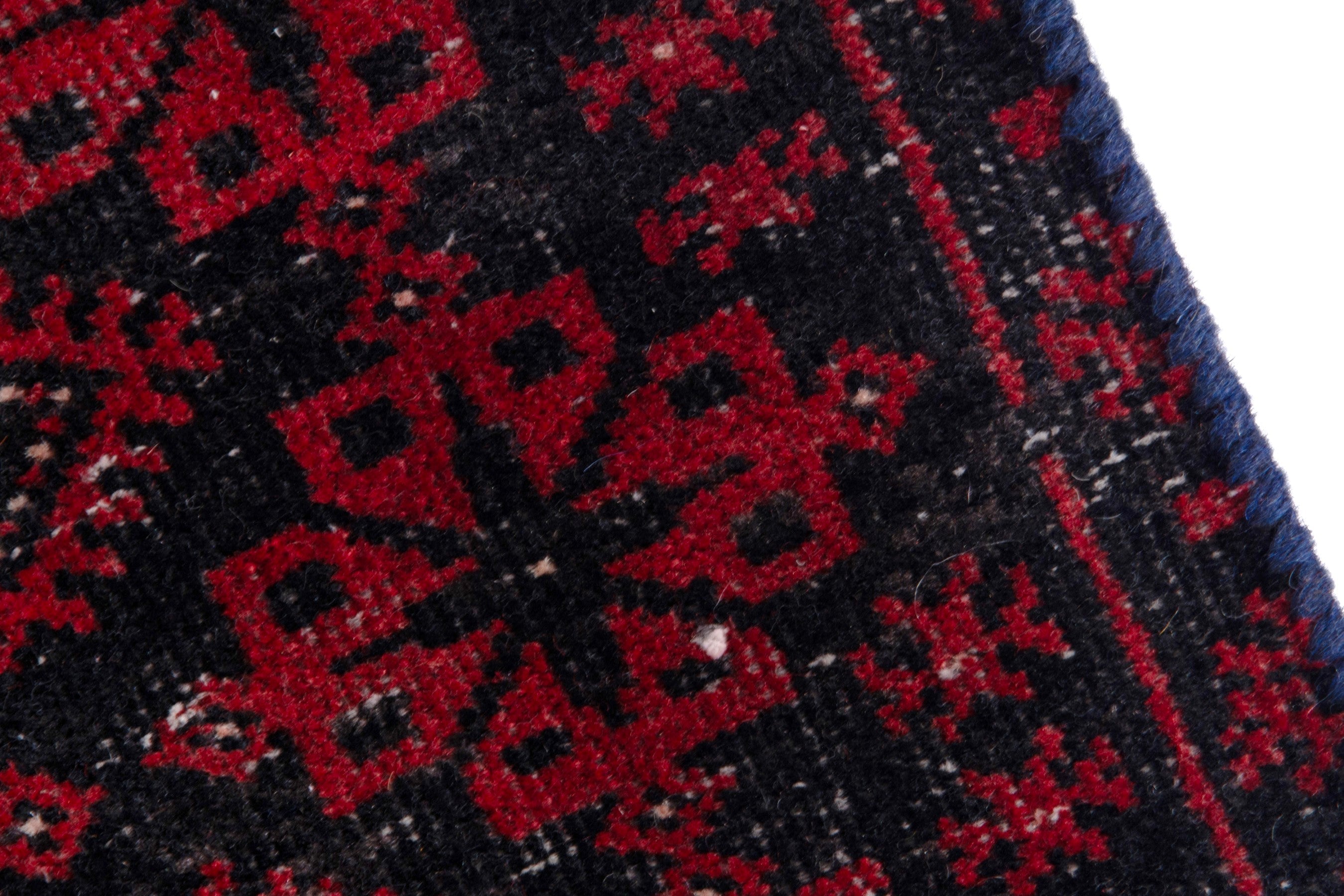 Persian Baluch accent rug in deep red and burgundy, view 7 of 17