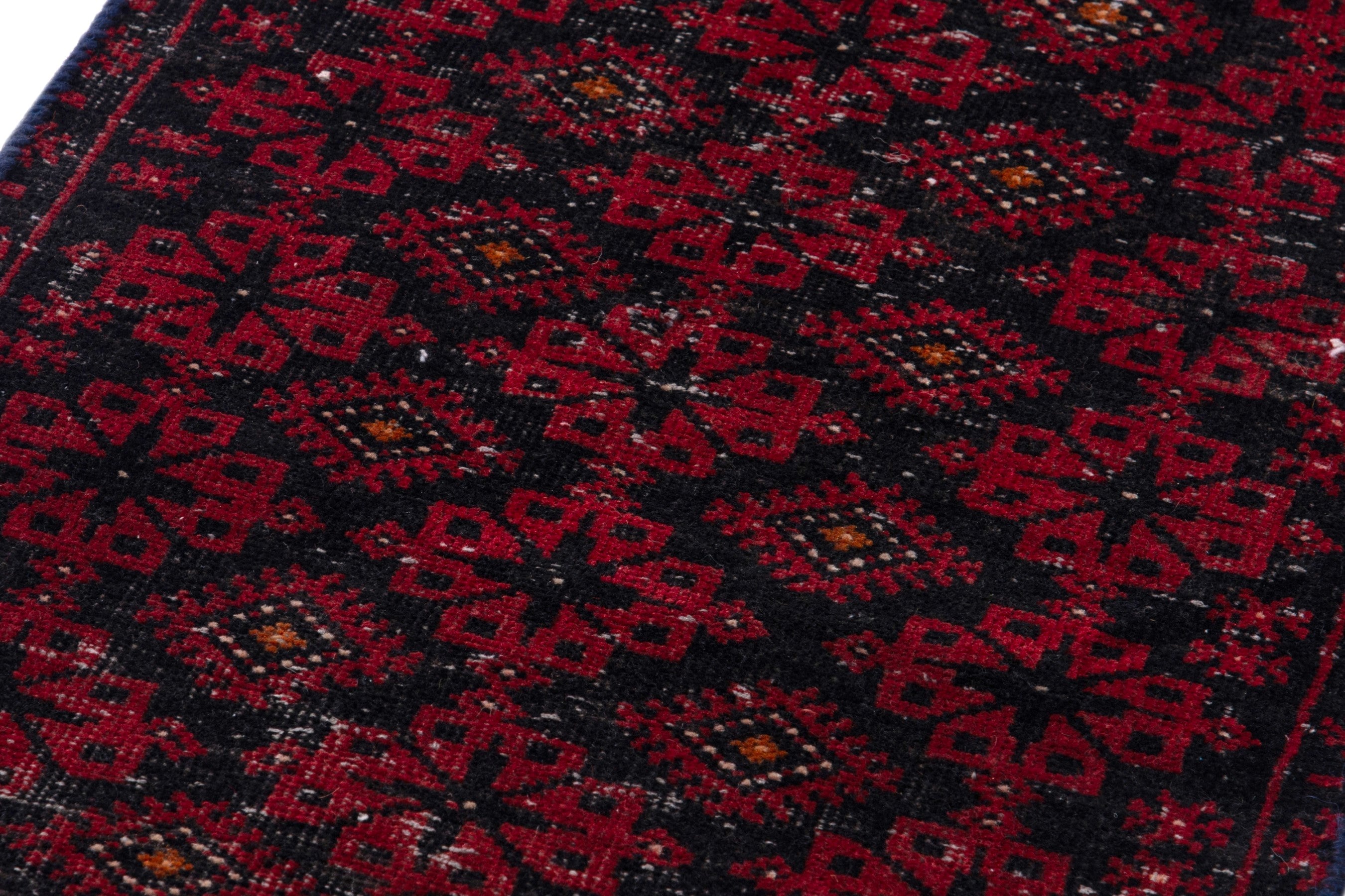 Persian Baluch accent rug in deep red and burgundy, view 9 of 17