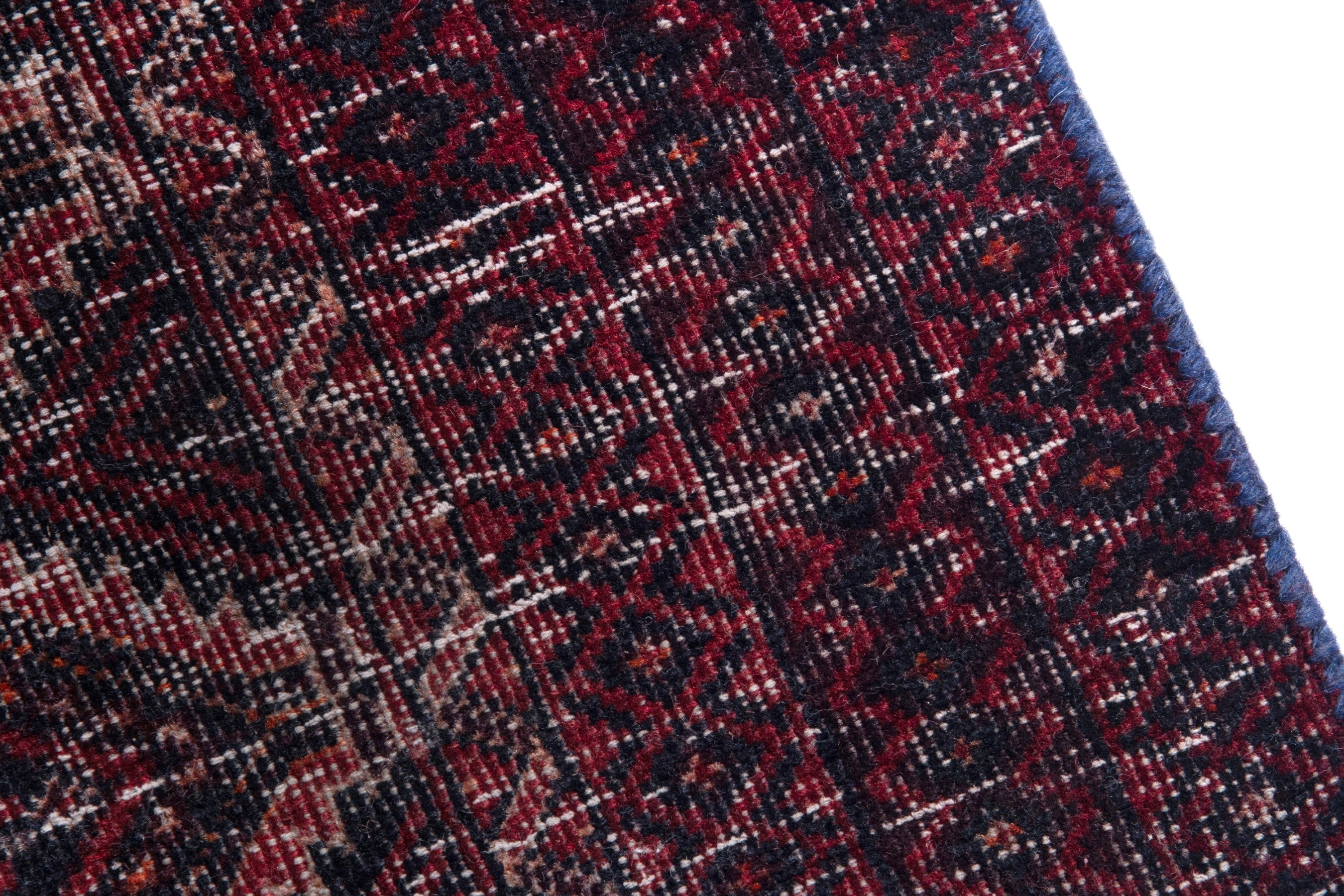 Persian Baluch runner rug in burgundy and rust, view 7 of 18