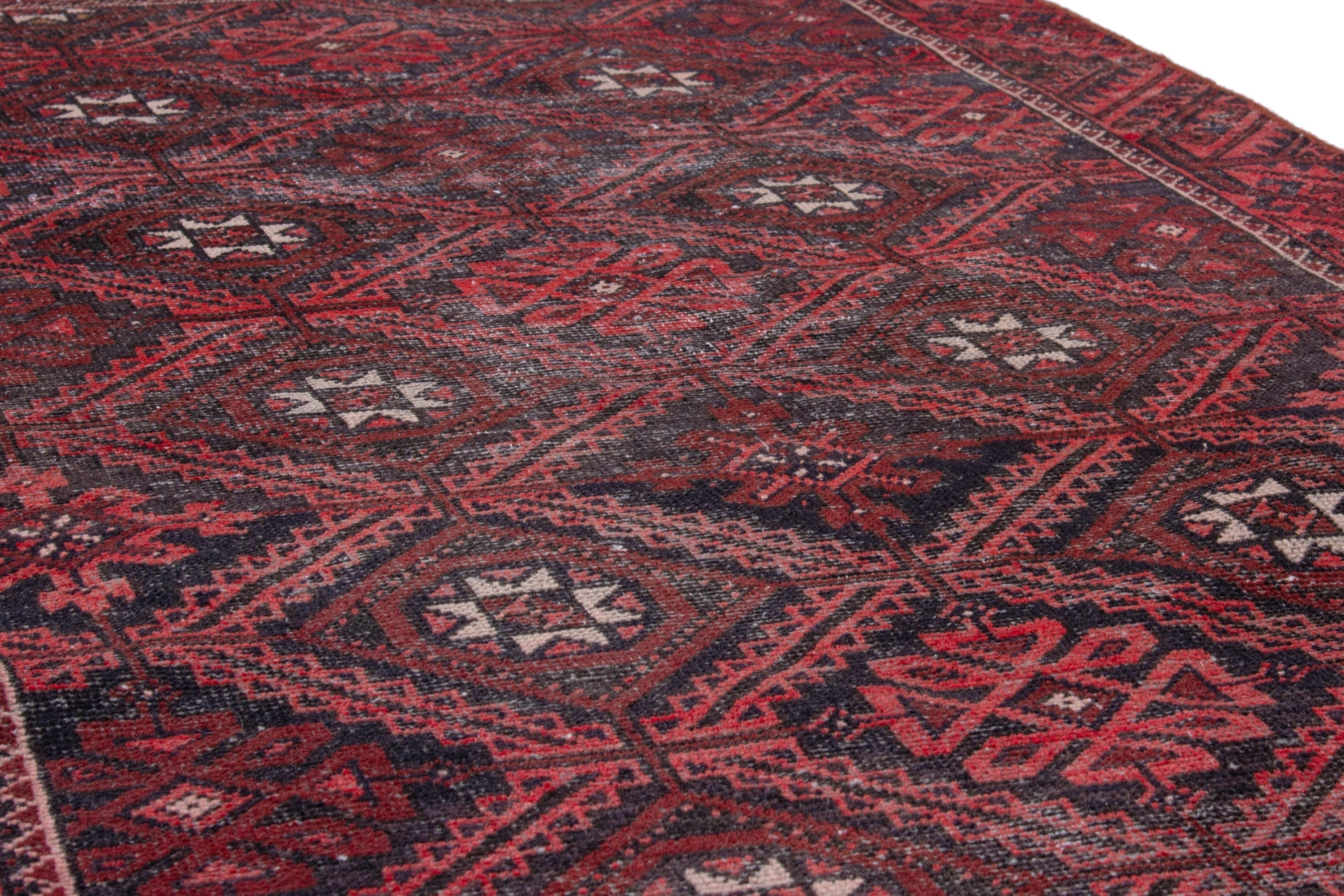 Persian Baluch accent rug in burgundy and deep red, view 9 of 16