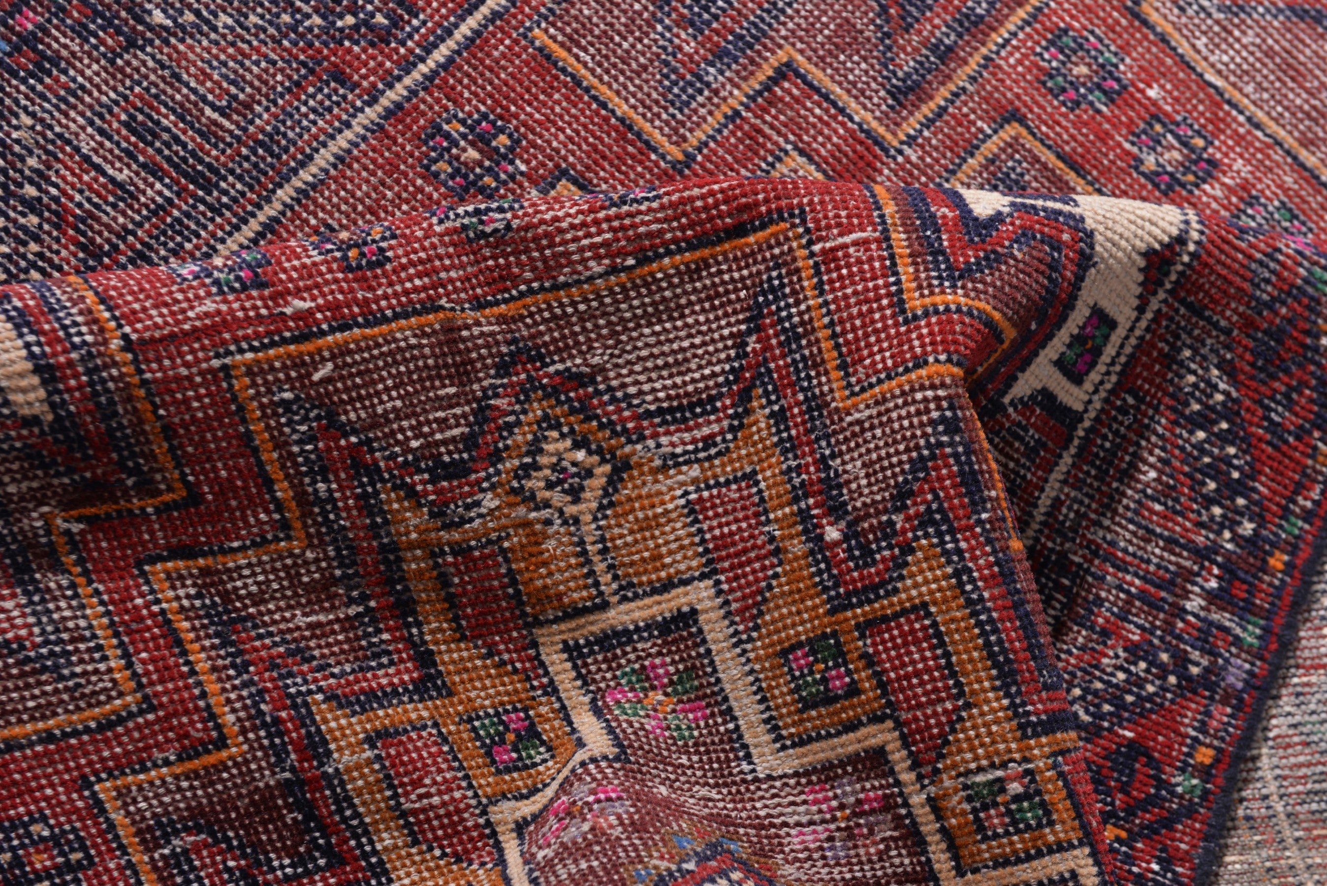 Persian Baluch runner rug in deep red and burgundy, view 15 of 17