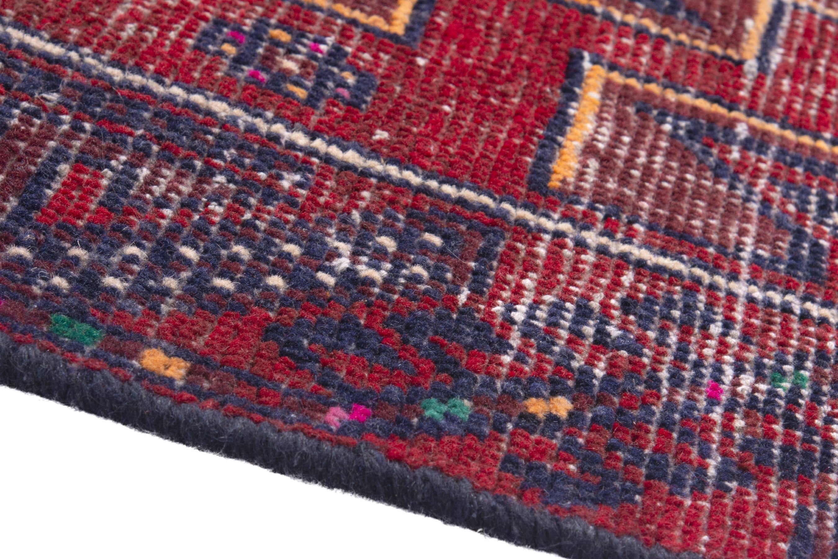Persian Baluch runner rug in deep red and burgundy, view 8 of 17