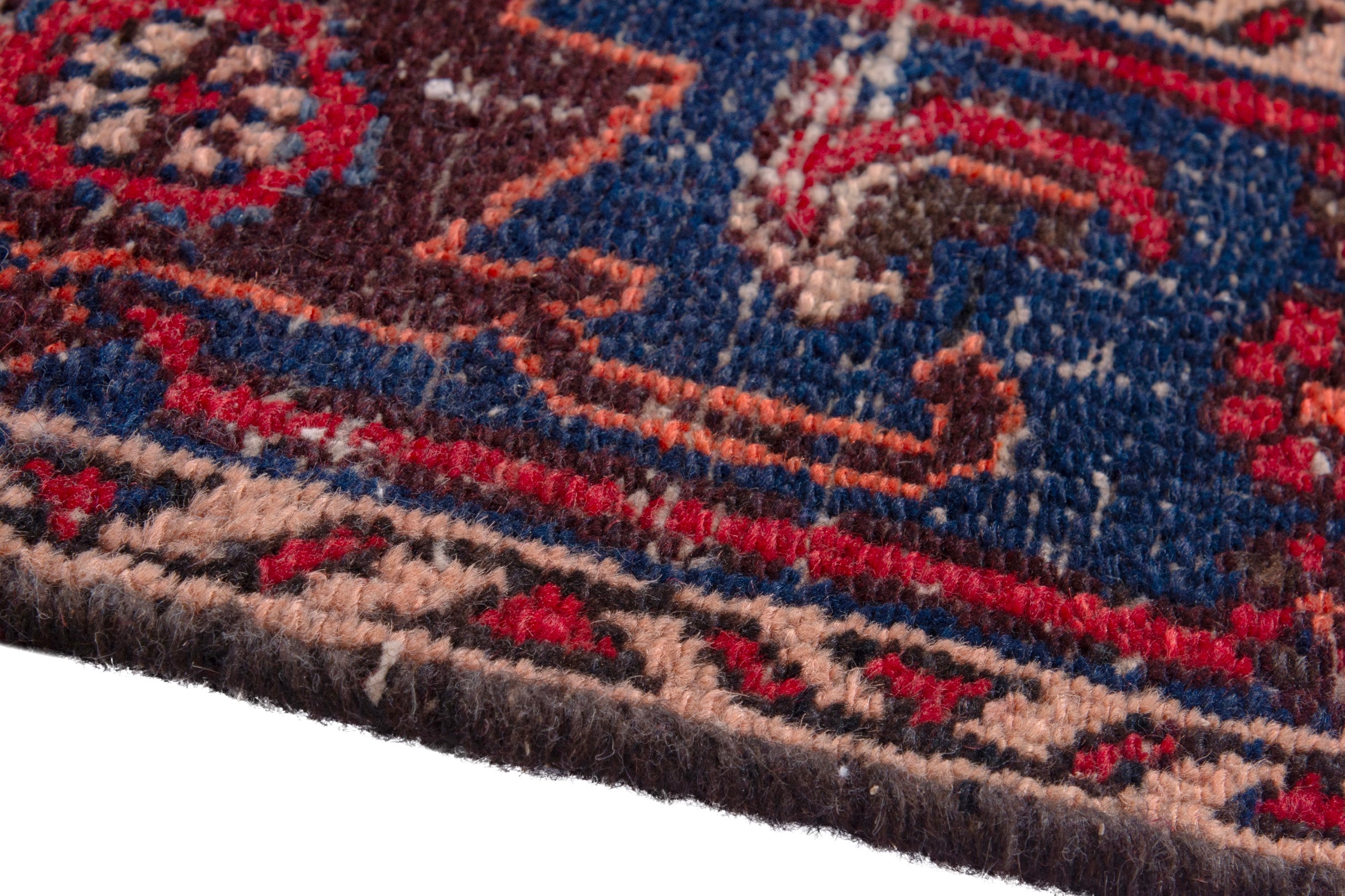 Persian Zanjan runner rug in faded red and dark blue, view 8 of 19