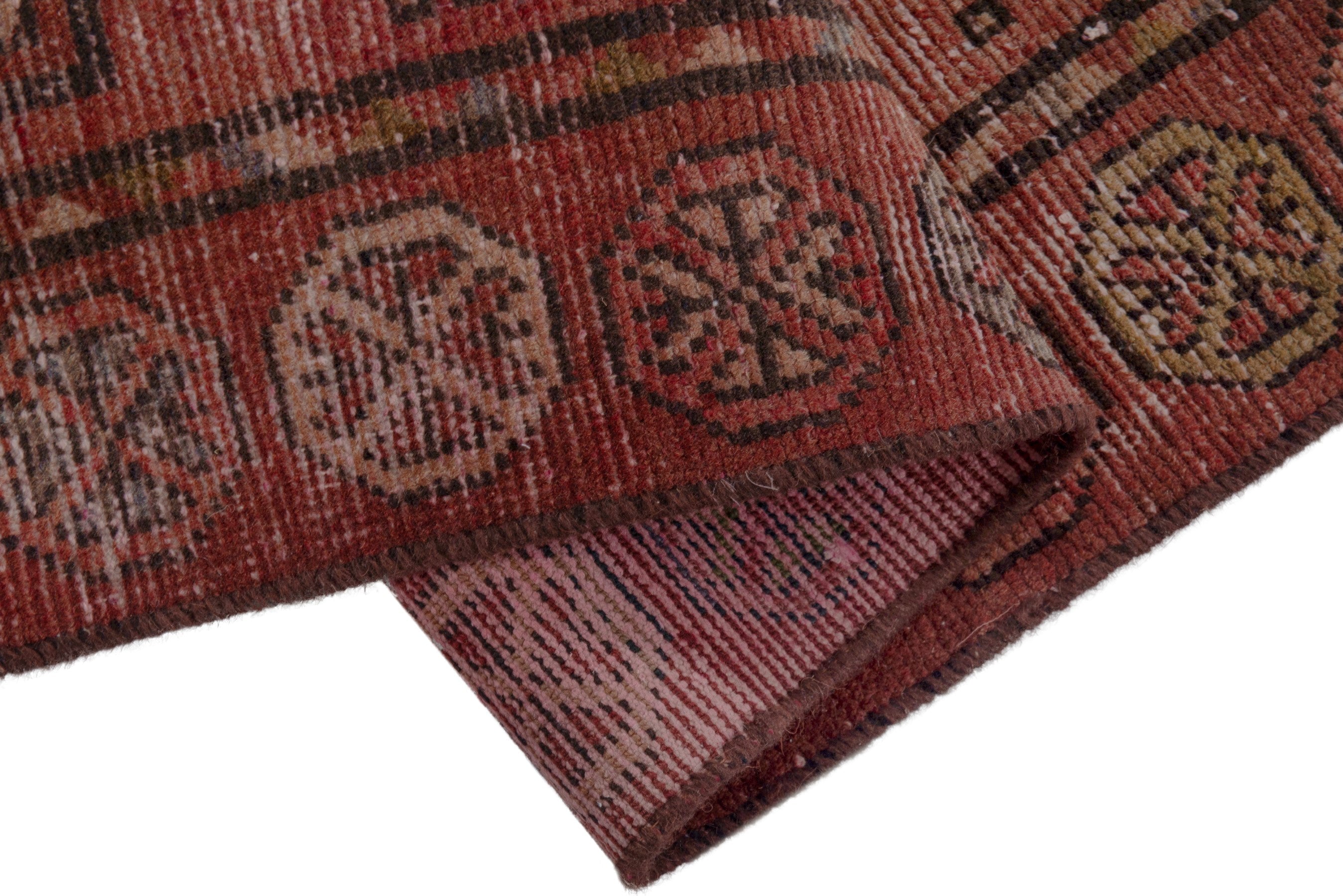 Persian Torkaman runner rug in faded red and muted pink, view 15 of 18