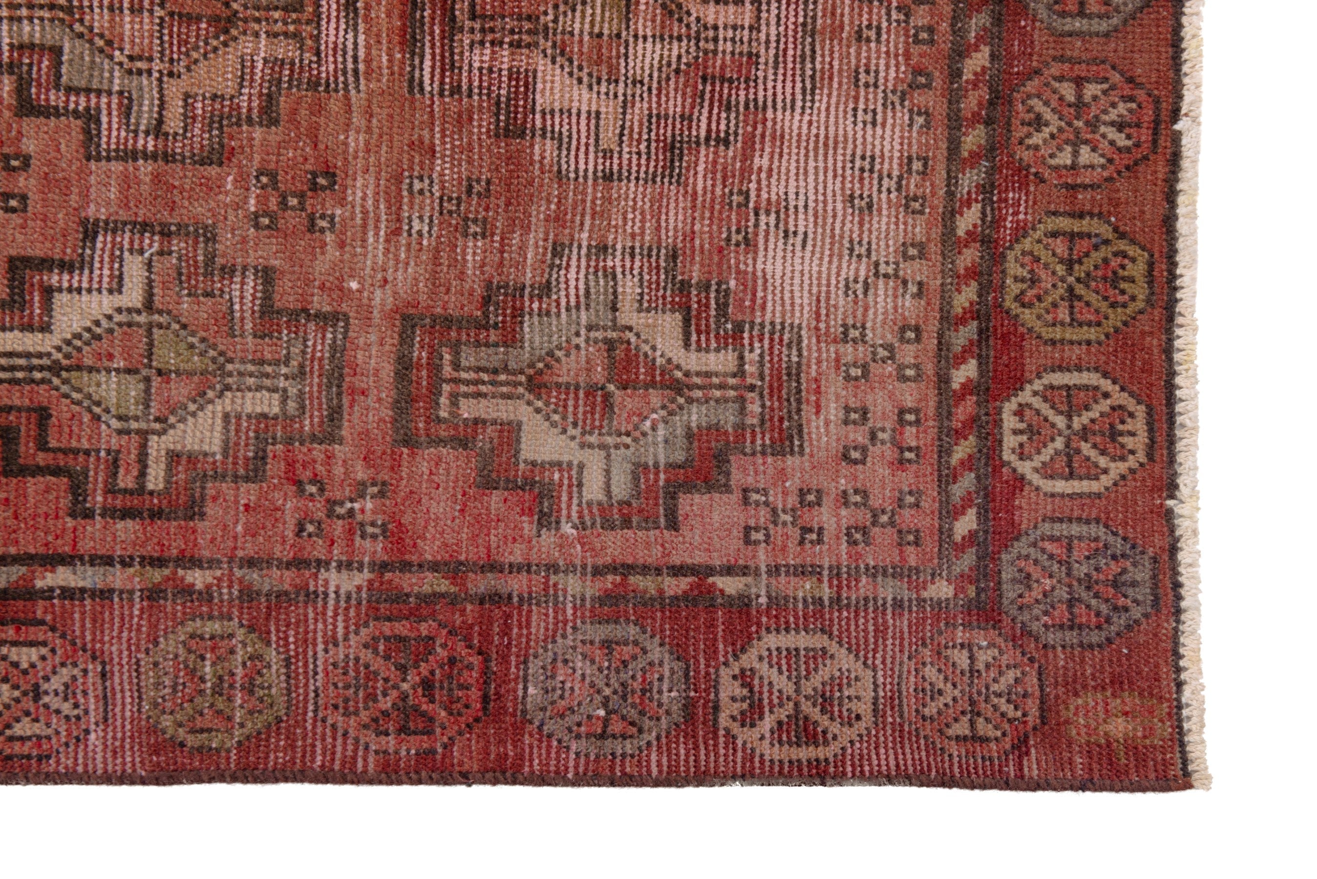 Persian Torkaman runner rug in faded red and muted pink, view 5 of 18