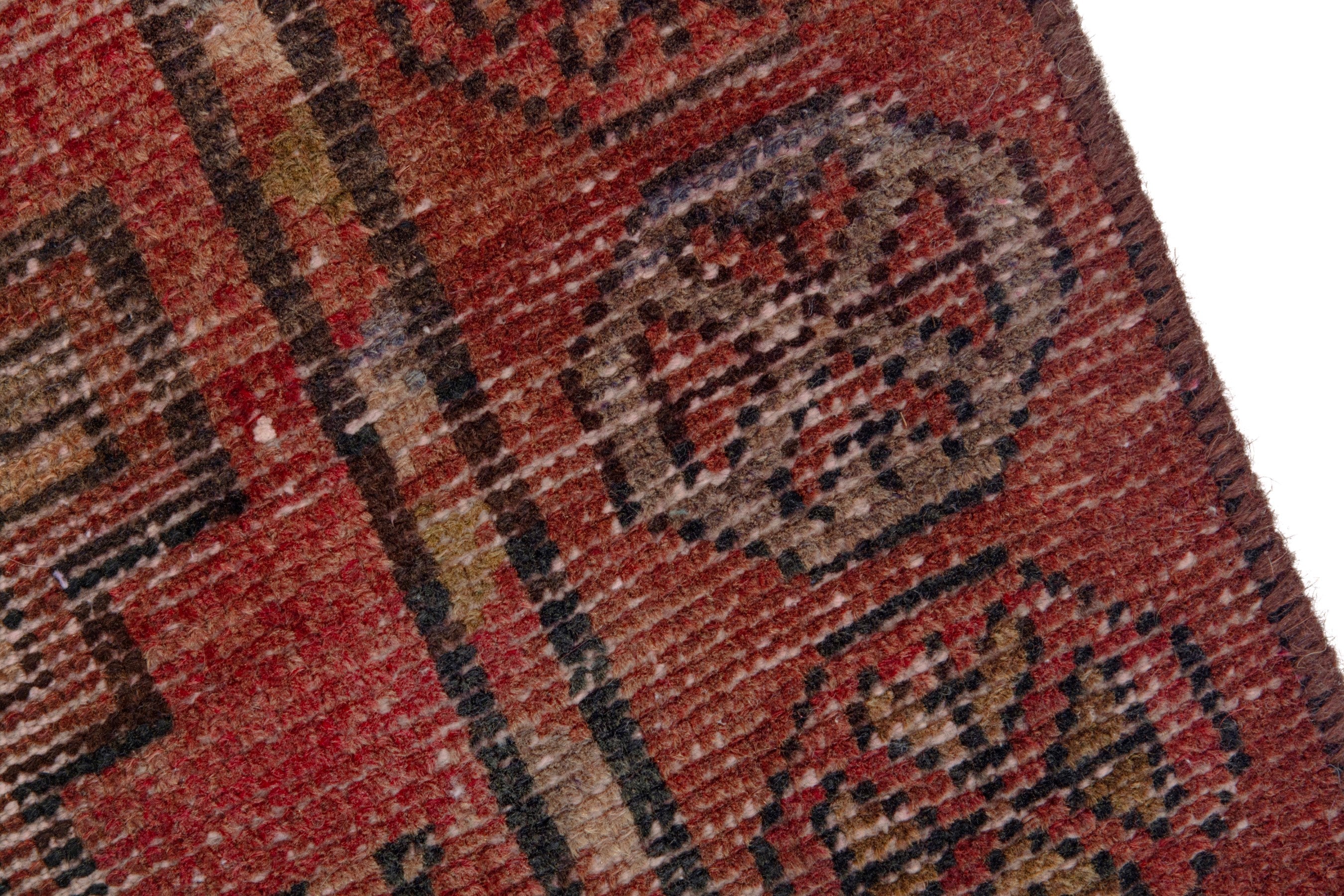Persian Torkaman runner rug in faded red and muted pink, view 7 of 18