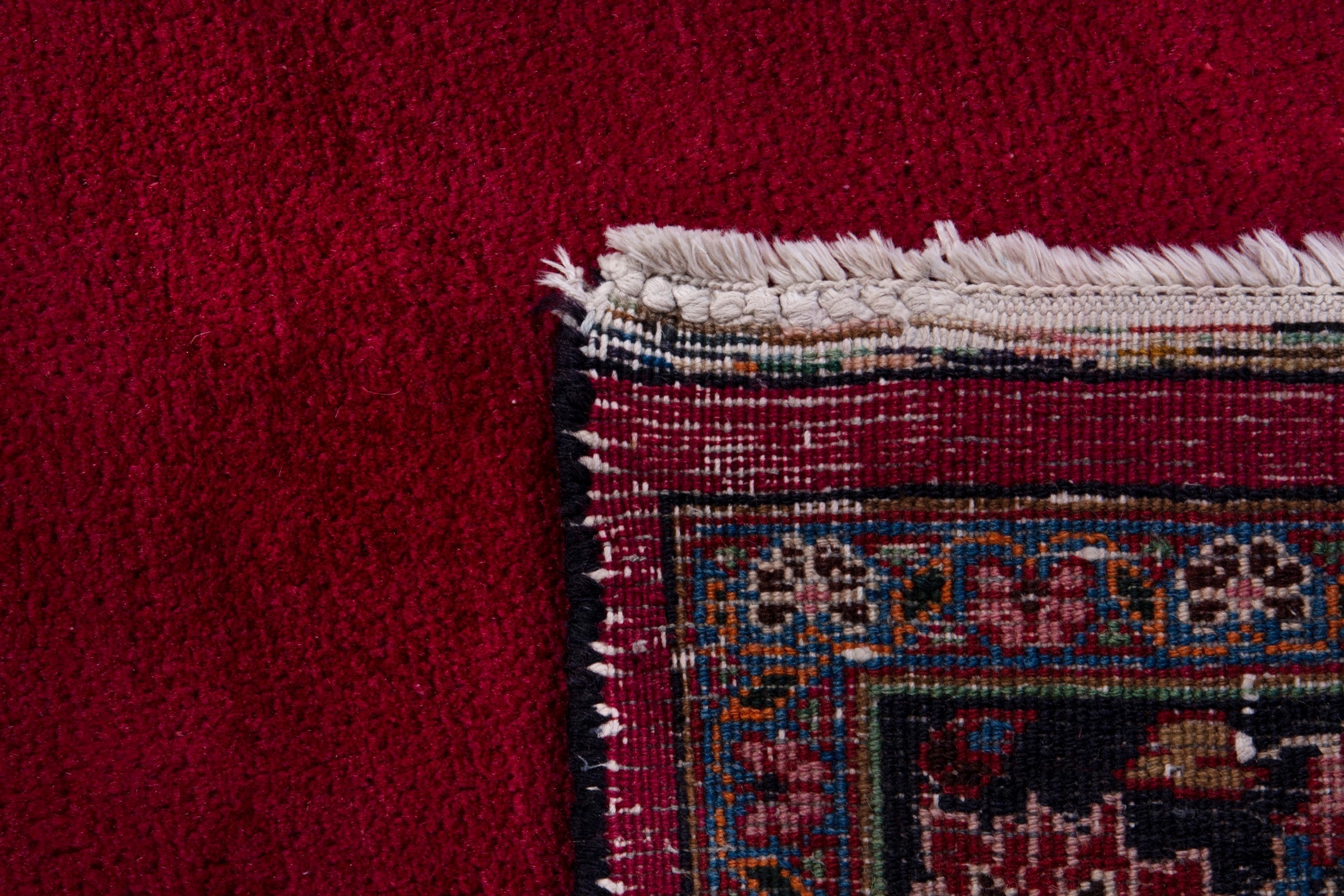 Persian Mashhad runner rug in burgundy and faded red, view 17 of 17