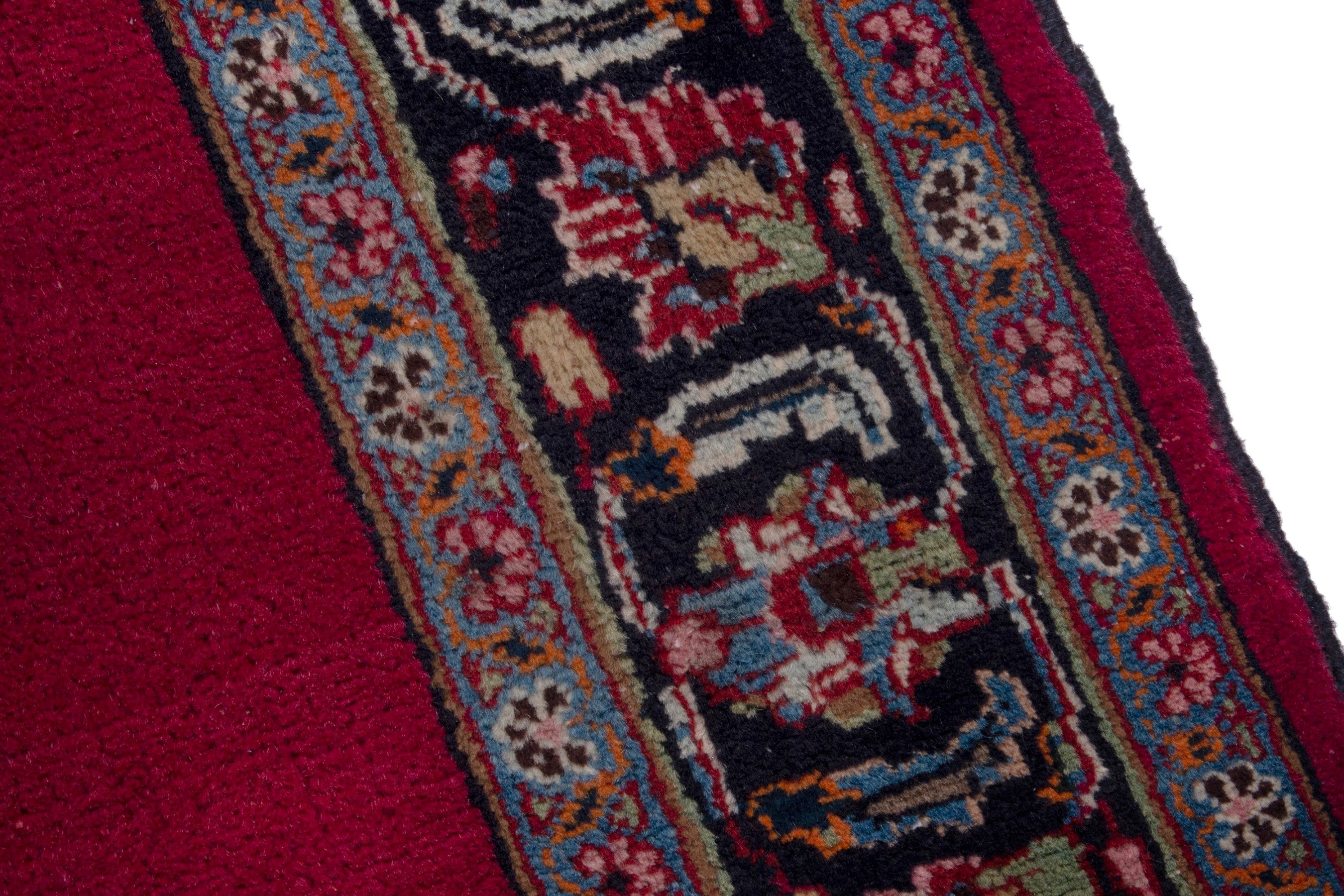 Persian Mashhad runner rug in burgundy and faded red, view 7 of 17