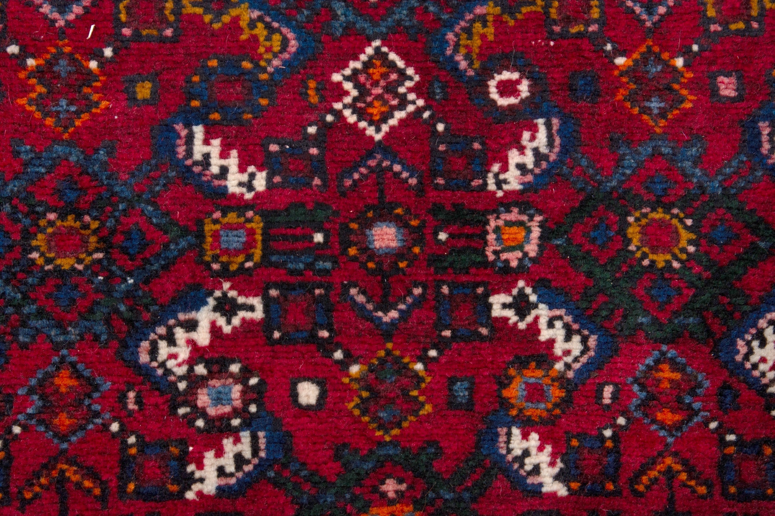 Persian Hosseinabad runner rug in burgundy and rust, view 11 of 17