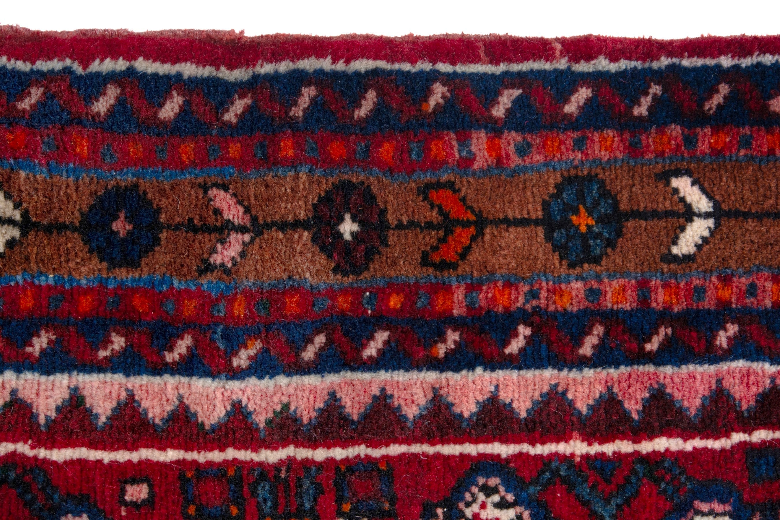 Persian Hosseinabad runner rug in burgundy and rust, view 12 of 17