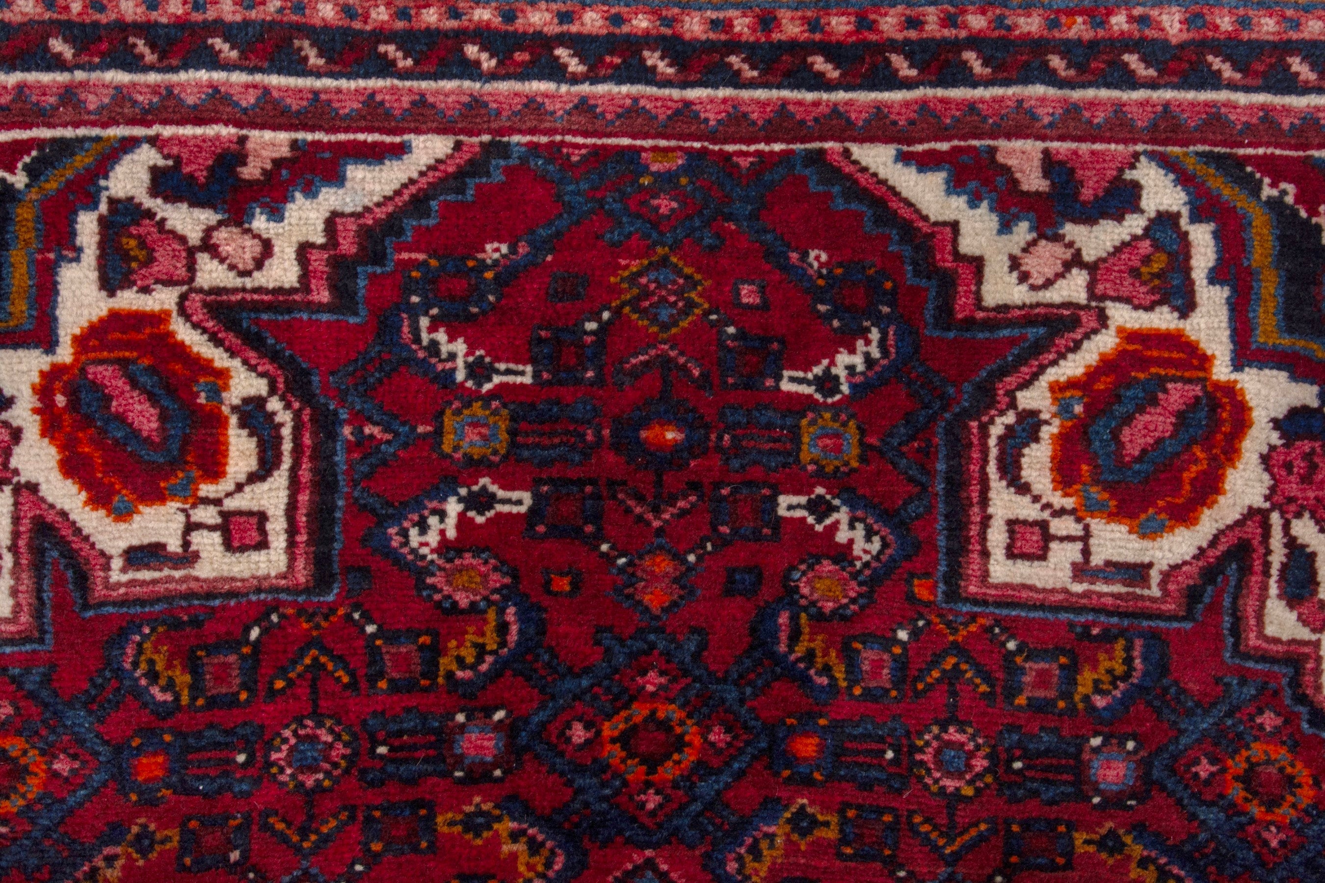 Persian Hosseinabad runner rug in burgundy and rust, view 13 of 17
