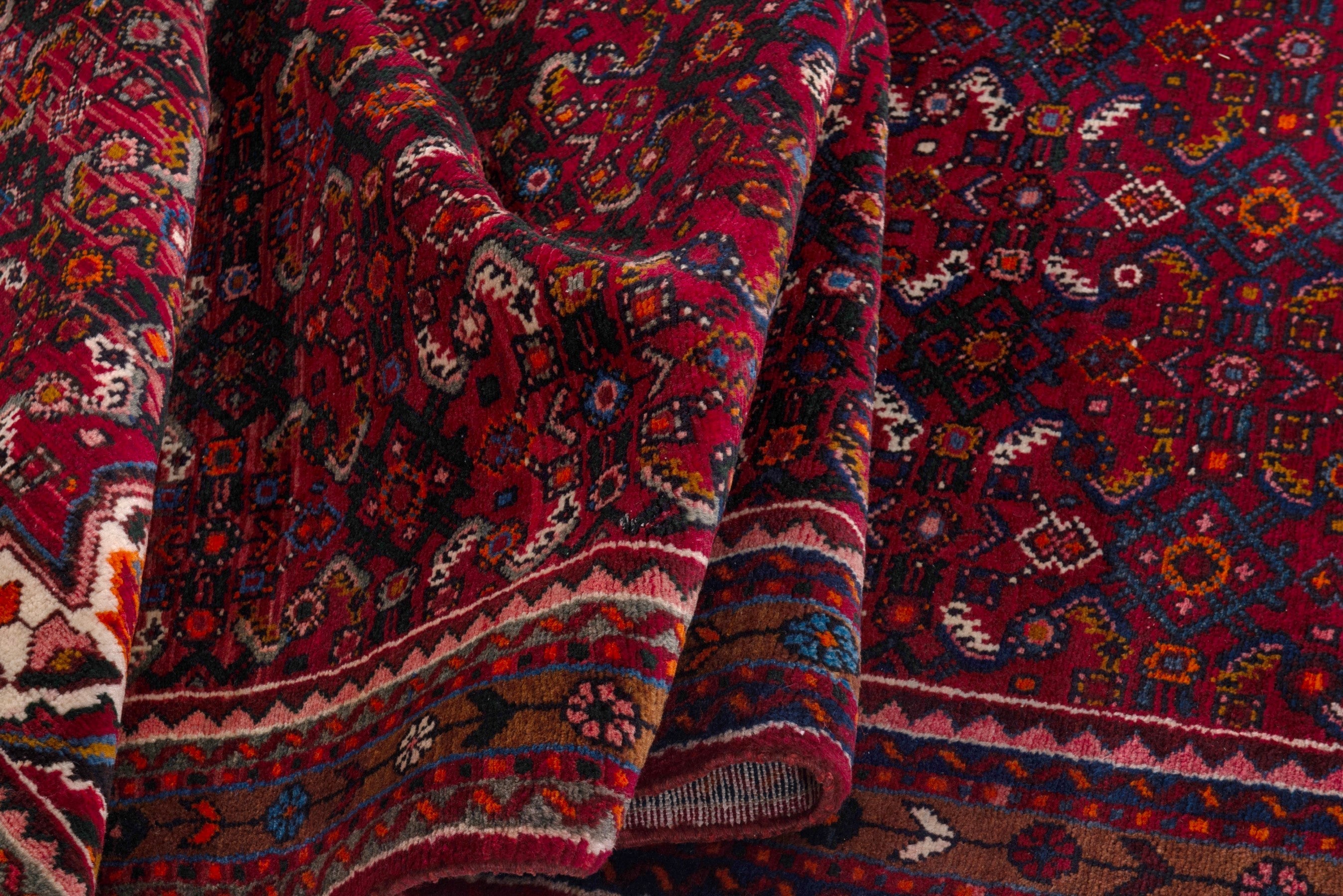 Persian Hosseinabad runner rug in burgundy and rust, view 15 of 17