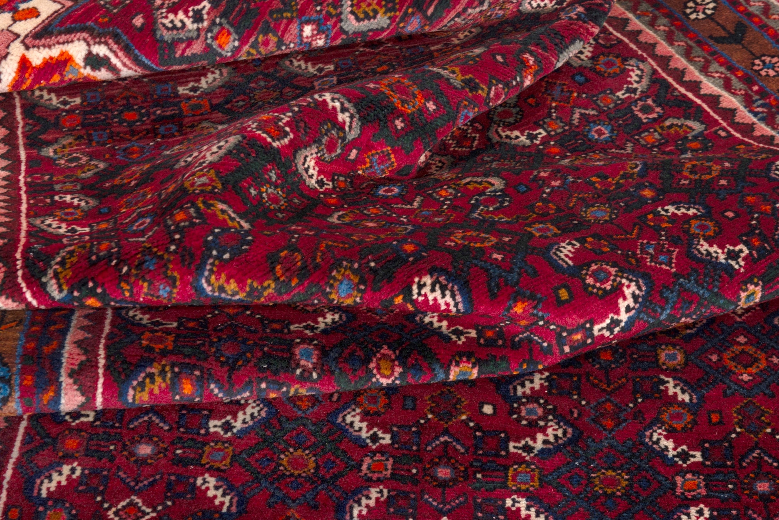 Persian Hosseinabad runner rug in burgundy and rust, view 16 of 17