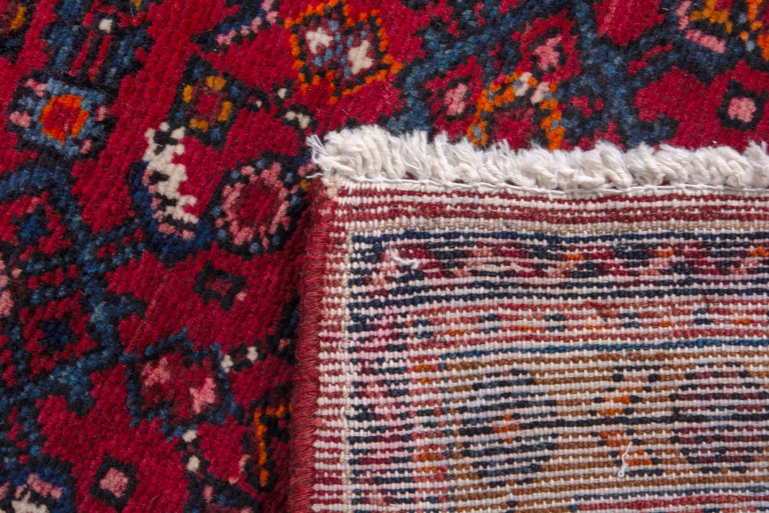 Persian Hosseinabad runner rug in burgundy and rust, view 17 of 17