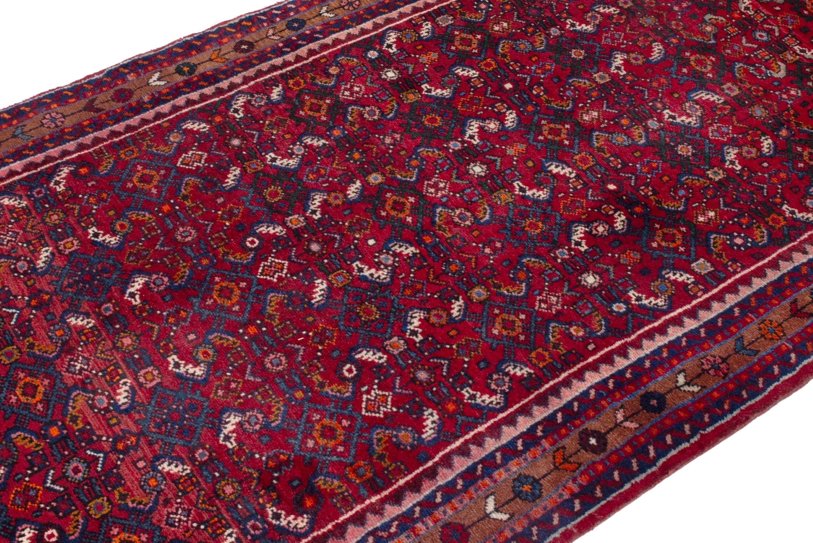 Persian Hosseinabad runner rug in burgundy and rust, view 6 of 17