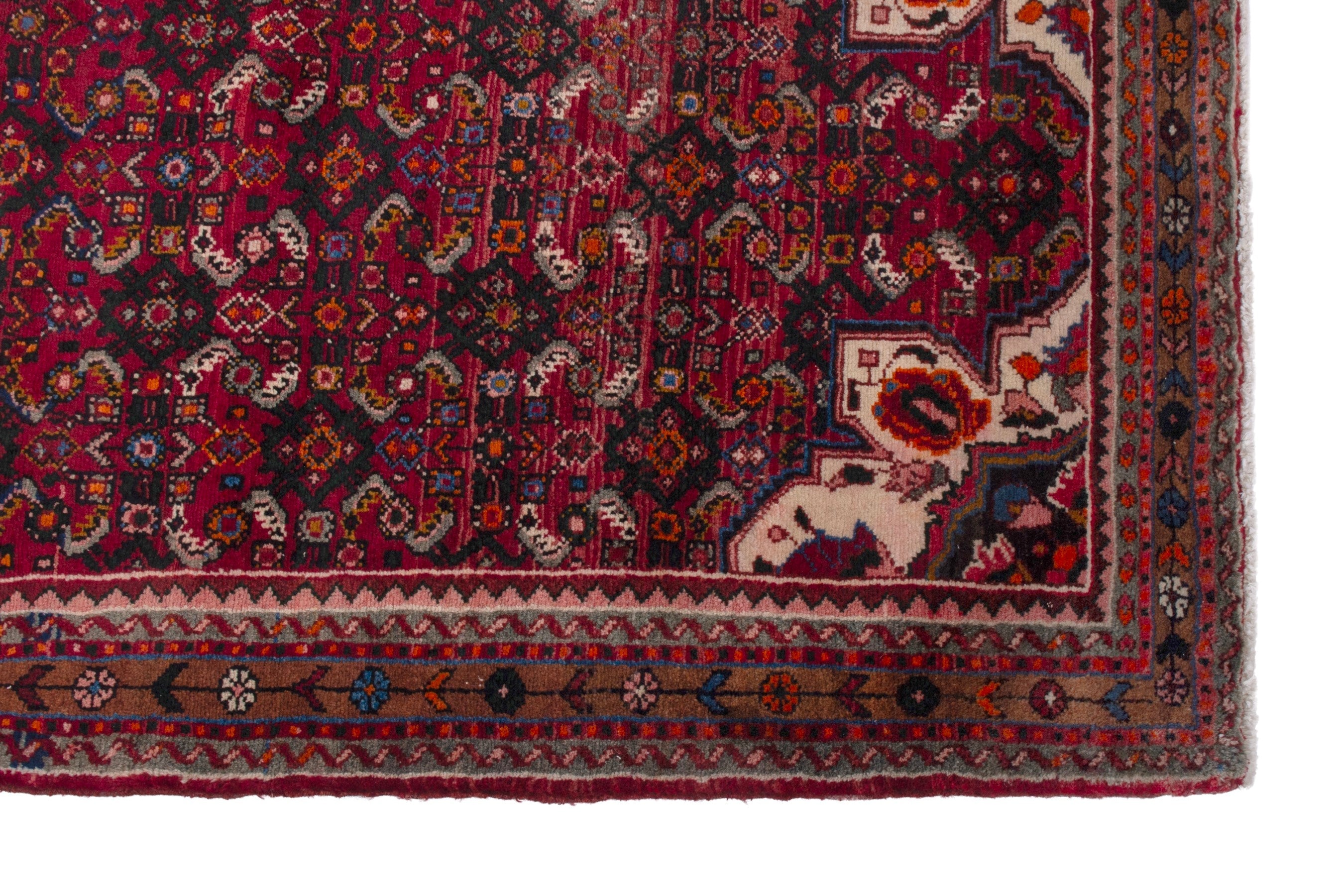 Persian Hosseinabad runner rug in burgundy and rust, view 5 of 17
