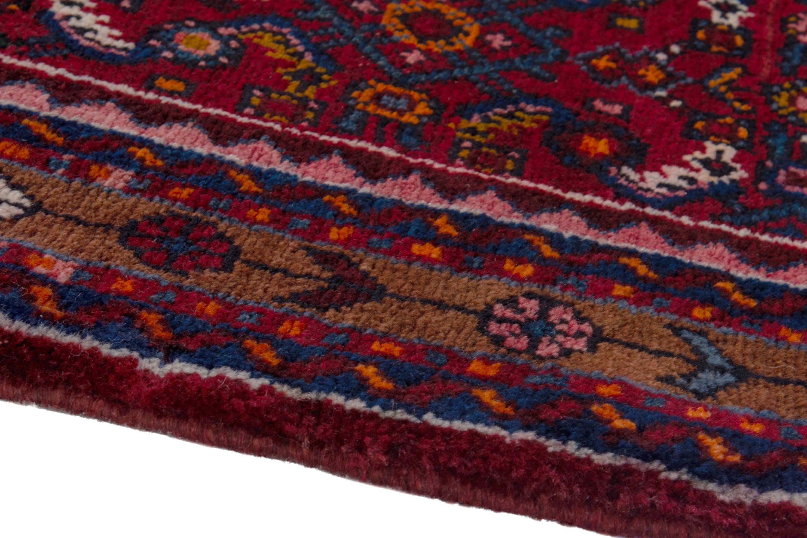 Persian Hosseinabad runner rug in burgundy and rust, view 8 of 17