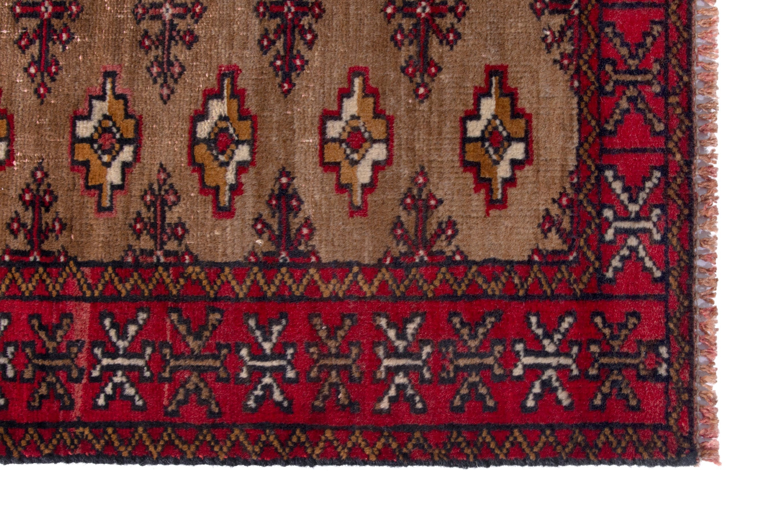 Persian Torkaman accent rug in tan and burgundy, view 5 of 7