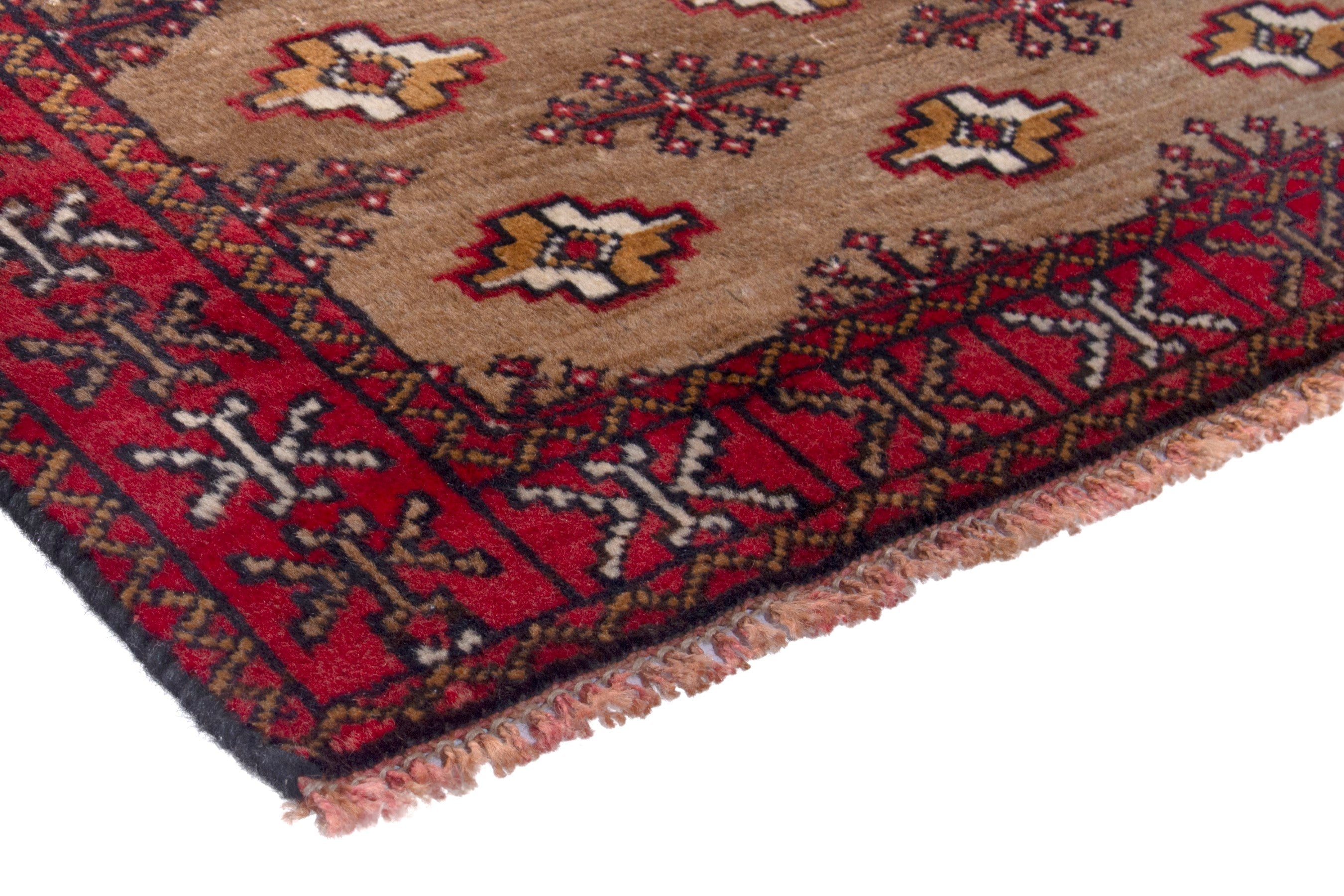Persian Torkaman accent rug in tan and burgundy, view 4 of 7
