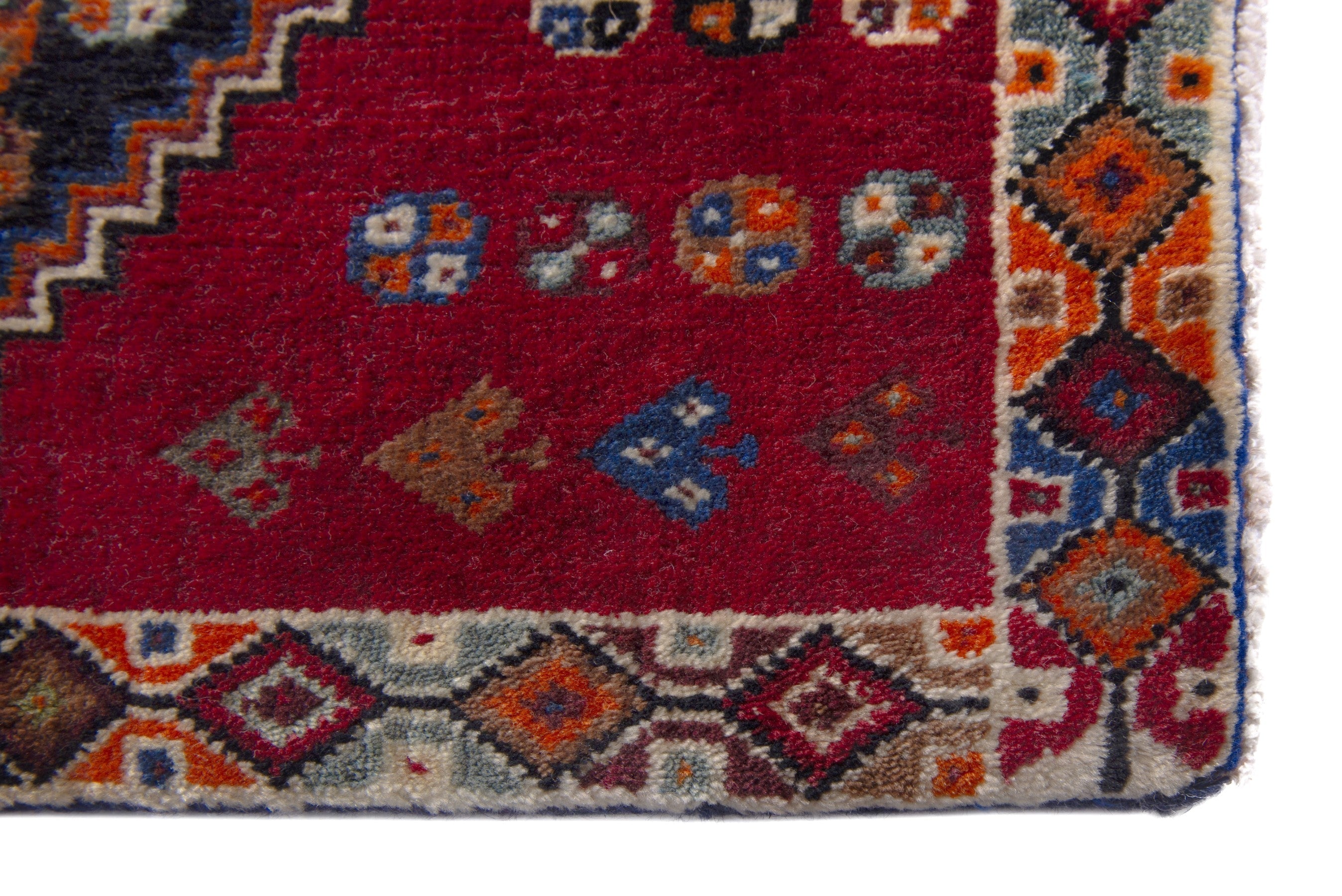 Persian Shiraz accent rug in deep red and dark brown, view 5 of 7