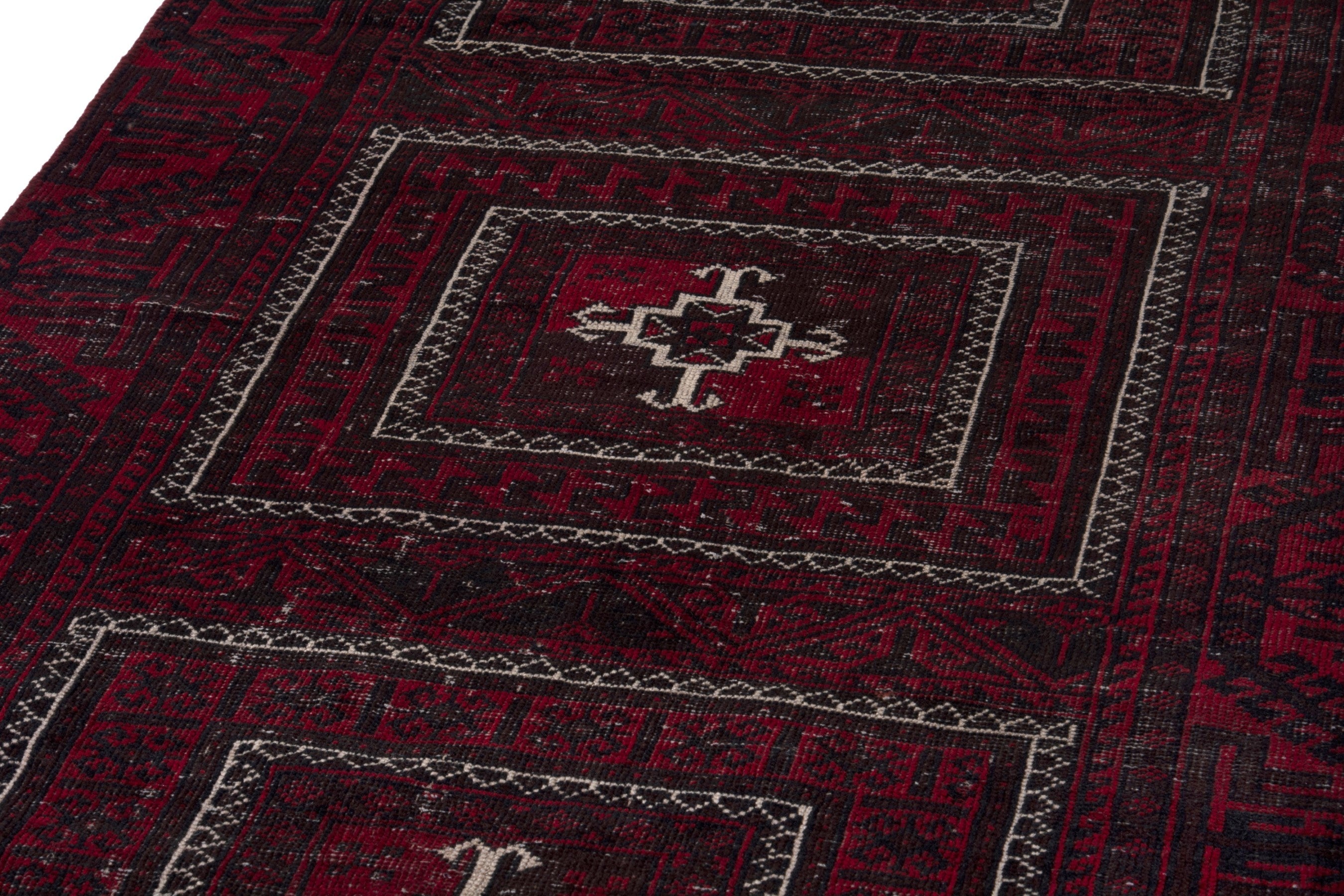Persian Baluch runner rug in burgundy and deep red, view 9 of 17