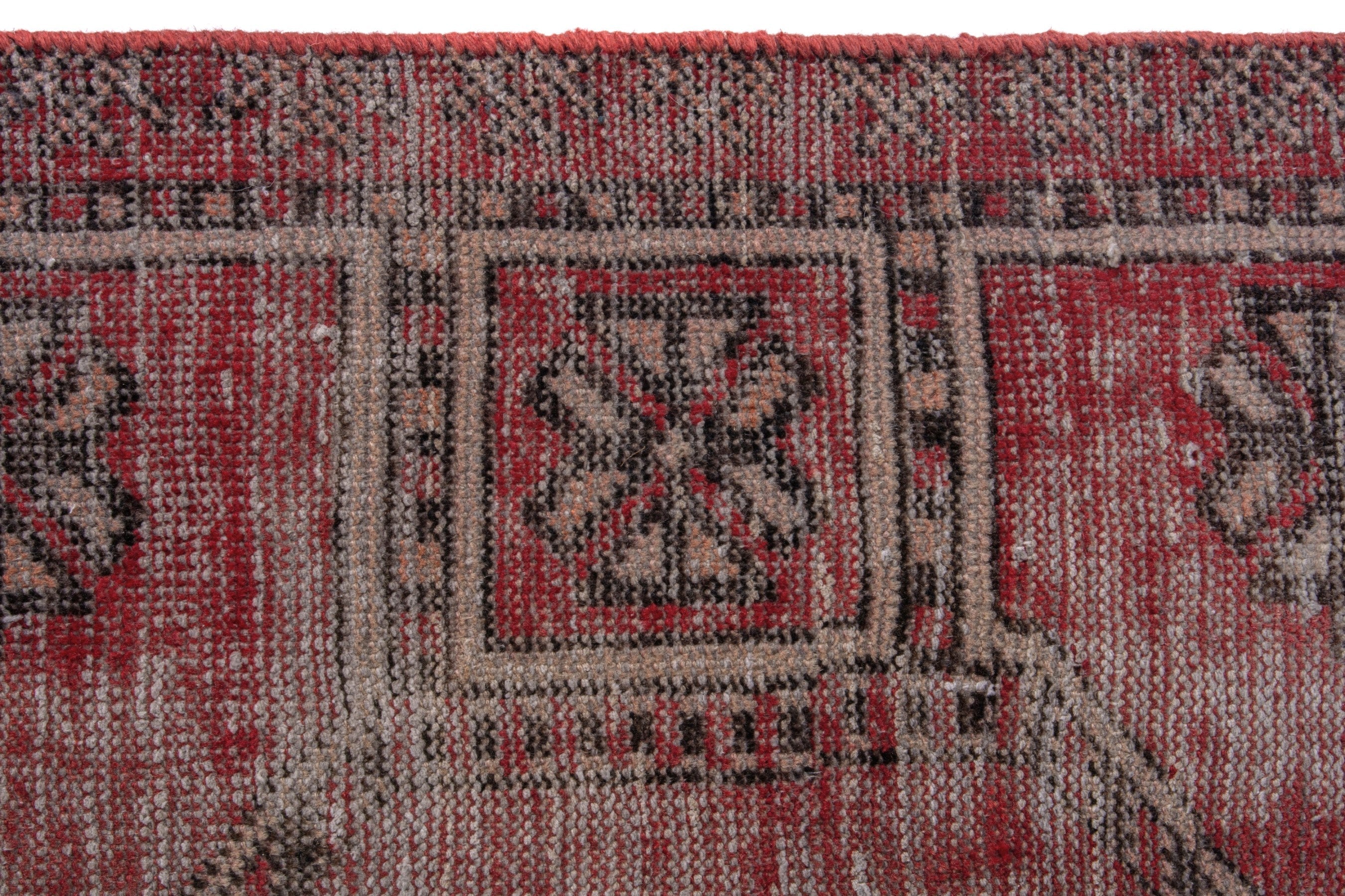 Persian Ferdos area rug in faded red and muted pink, view 11 of 17