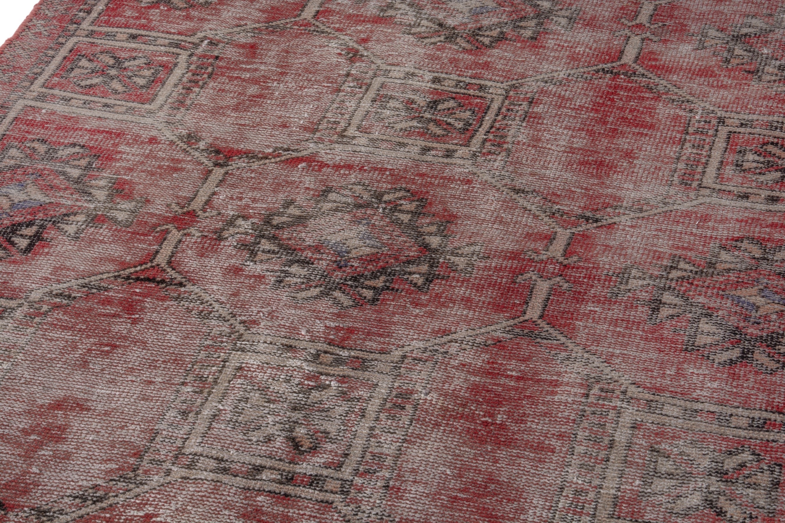 Persian Ferdos area rug in faded red and muted pink, view 9 of 17