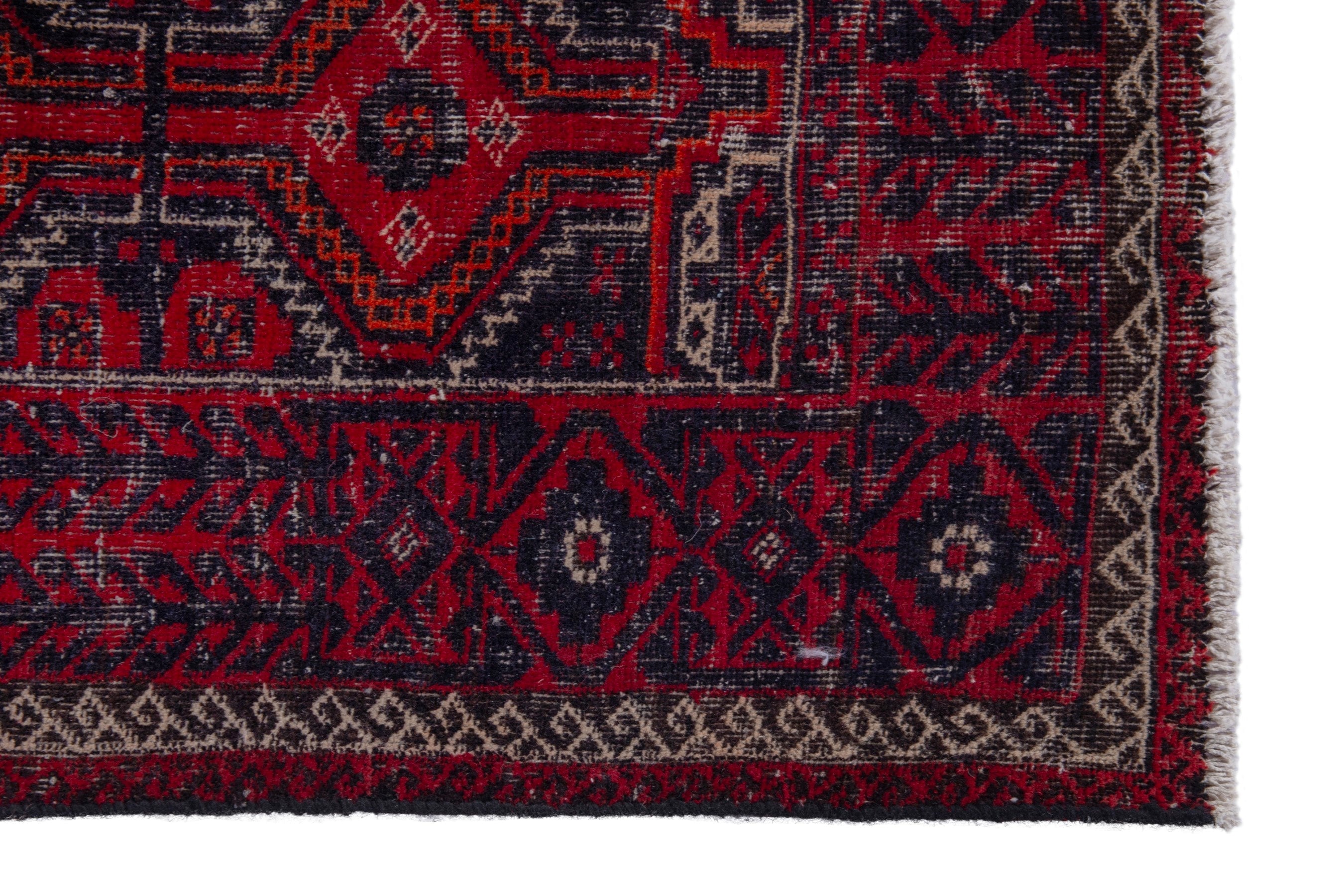 Persian Baluch accent rug in burgundy and faded red, view 5 of 17