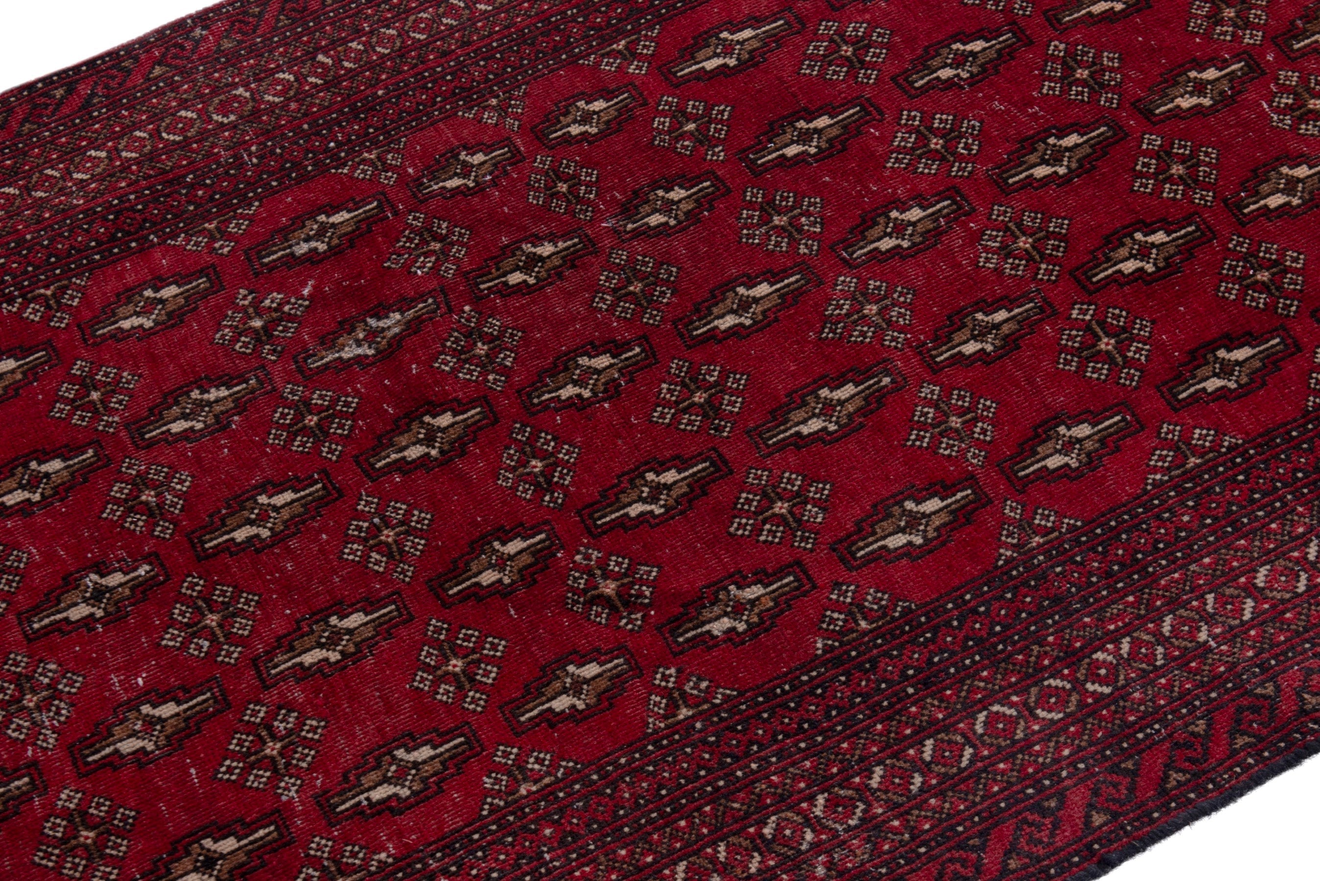 Persian Baluch runner rug in burgundy and dark brown, view 6 of 18
