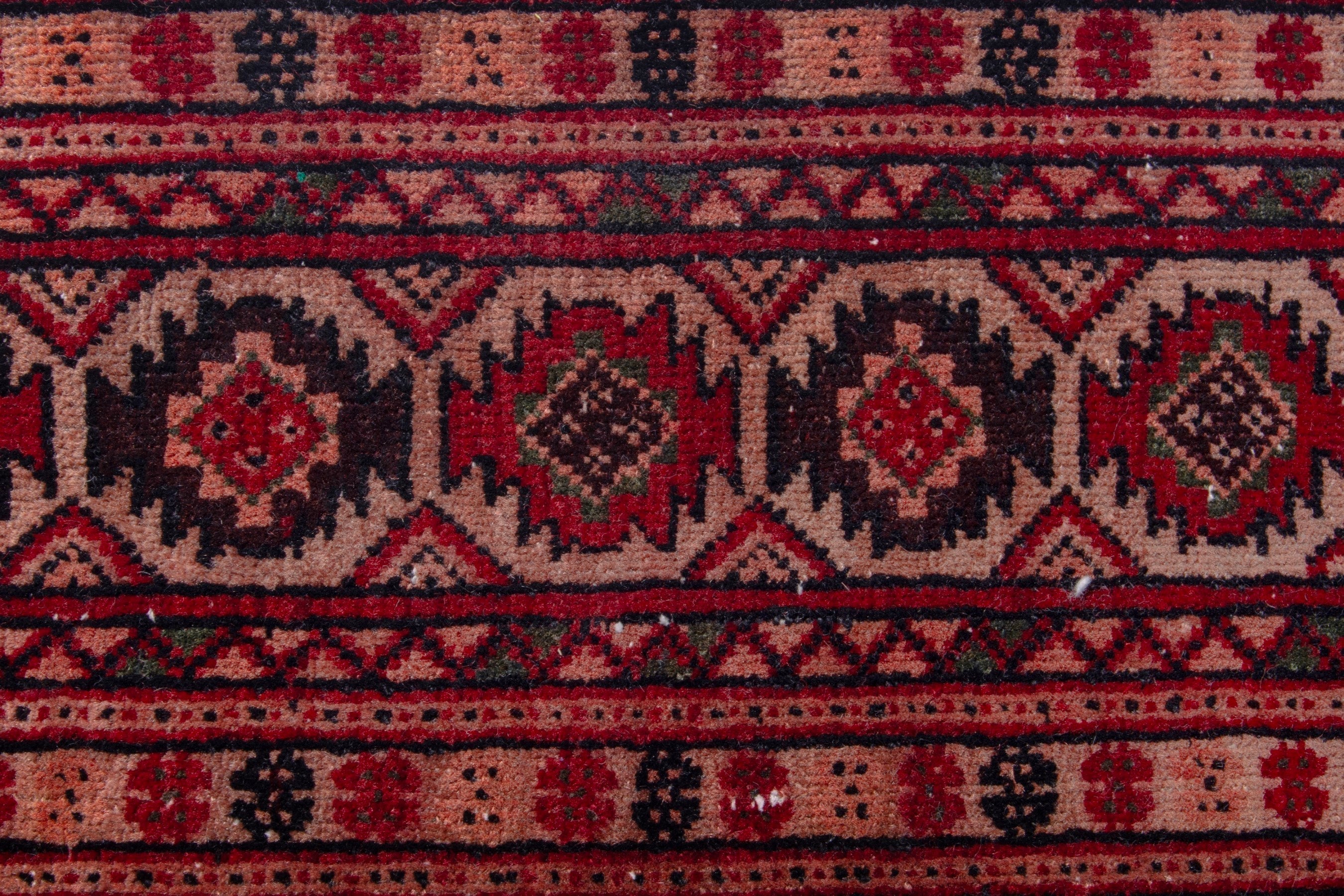 Persian Baluch accent rug in deep red and cream, view 12 of 19