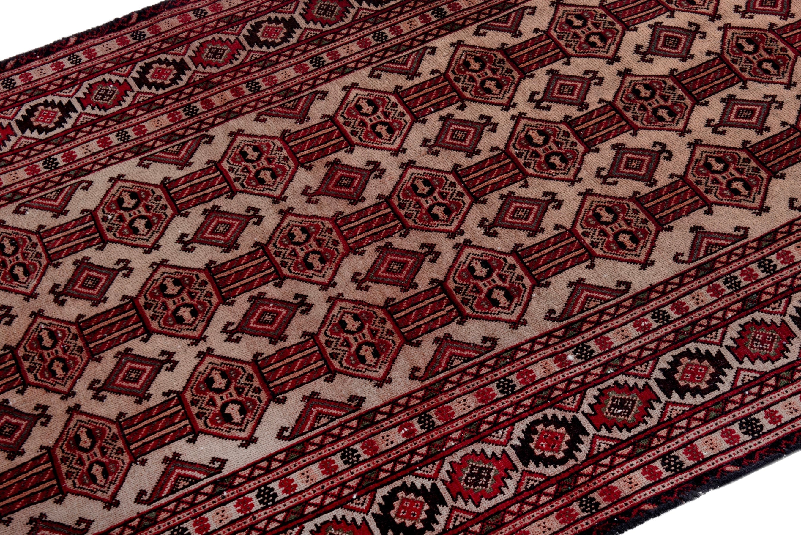 Persian Baluch accent rug in deep red and cream, view 6 of 19