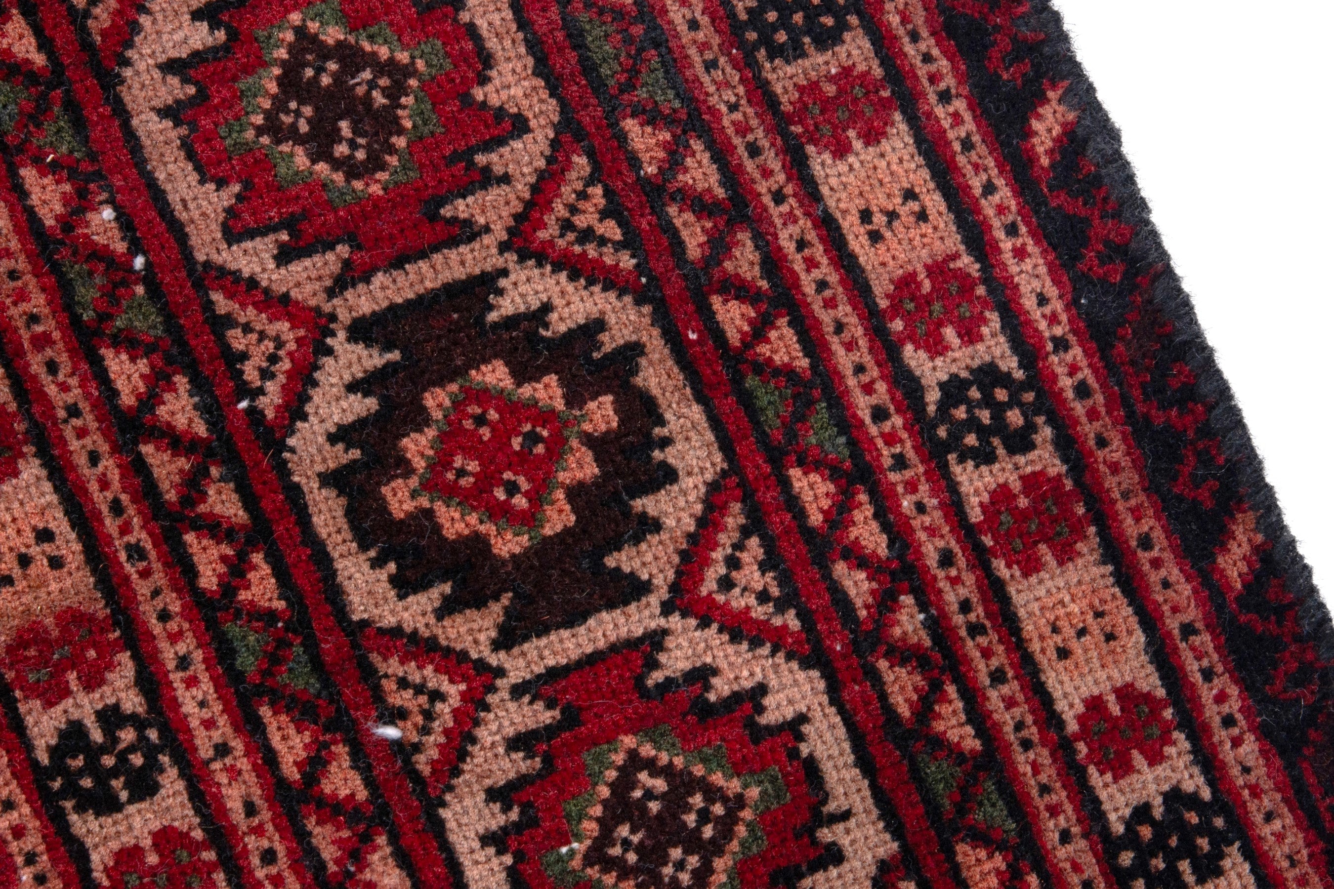 Persian Baluch accent rug in deep red and cream, view 7 of 19