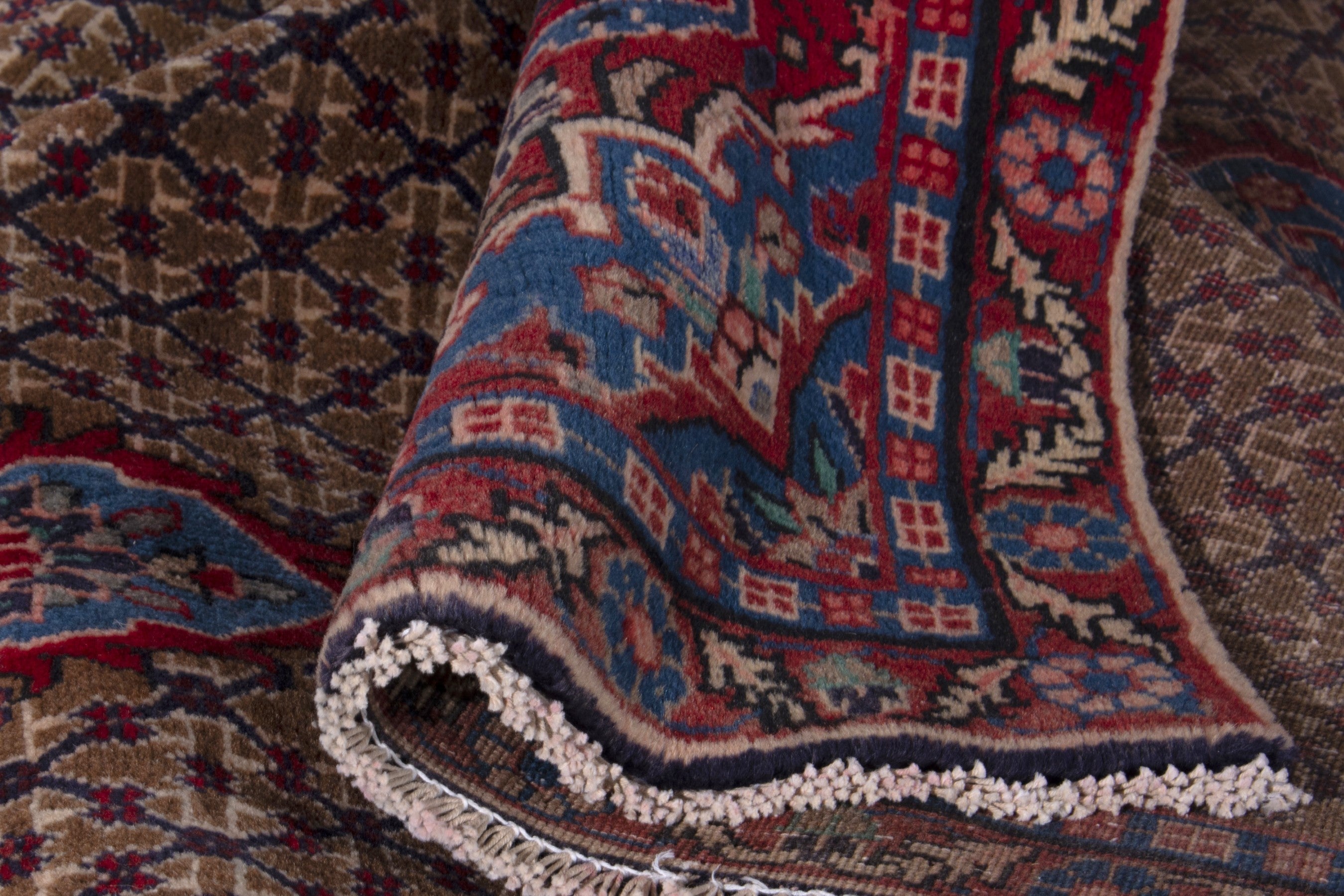 Persian Songhor area rug in tan and burgundy, view 15 of 17