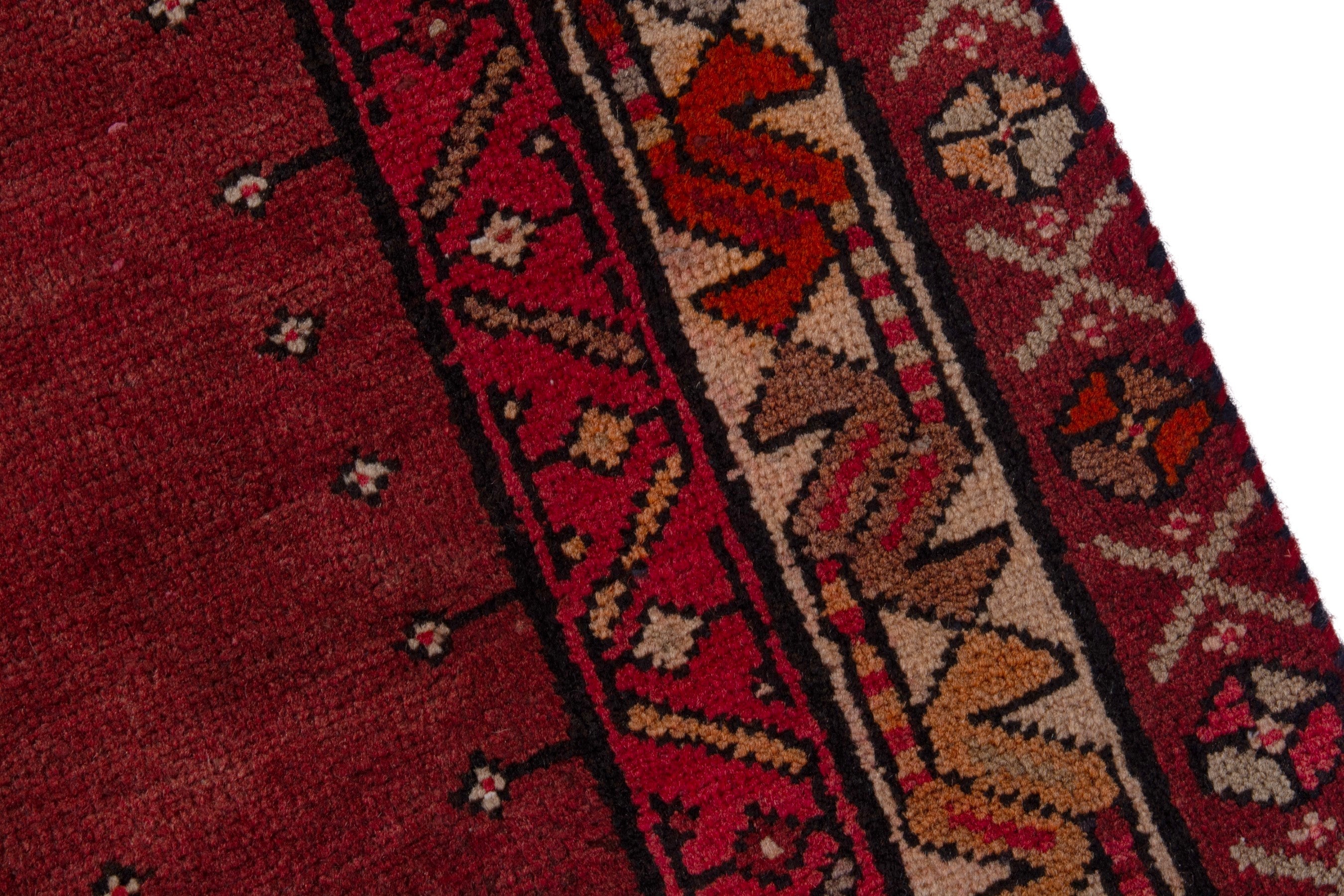 Persian Ardabil runner rug in deep red and burnt orange, view 7 of 17