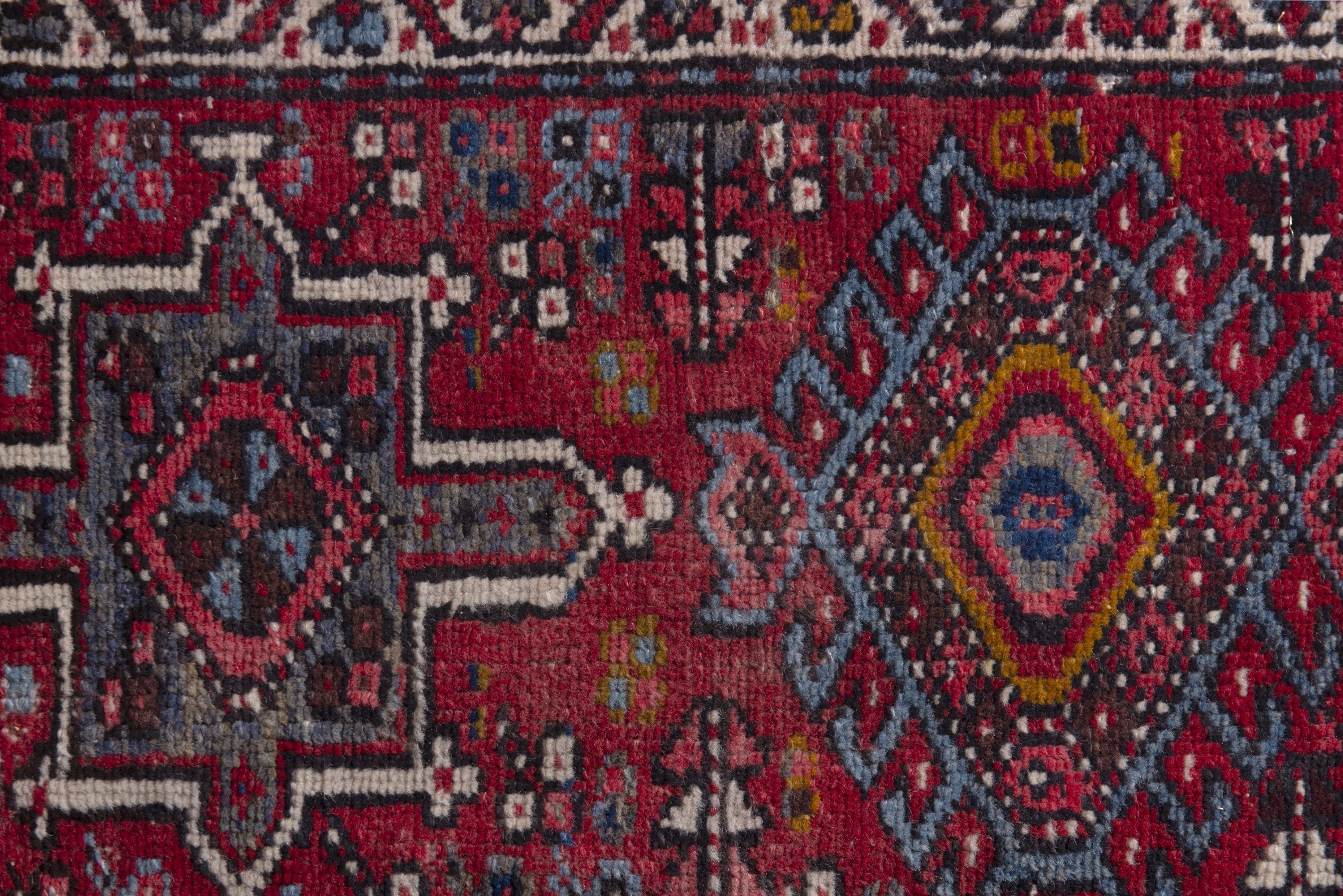 Persian Gharajeh accent rug in deep red and burgundy, view 6 of 7