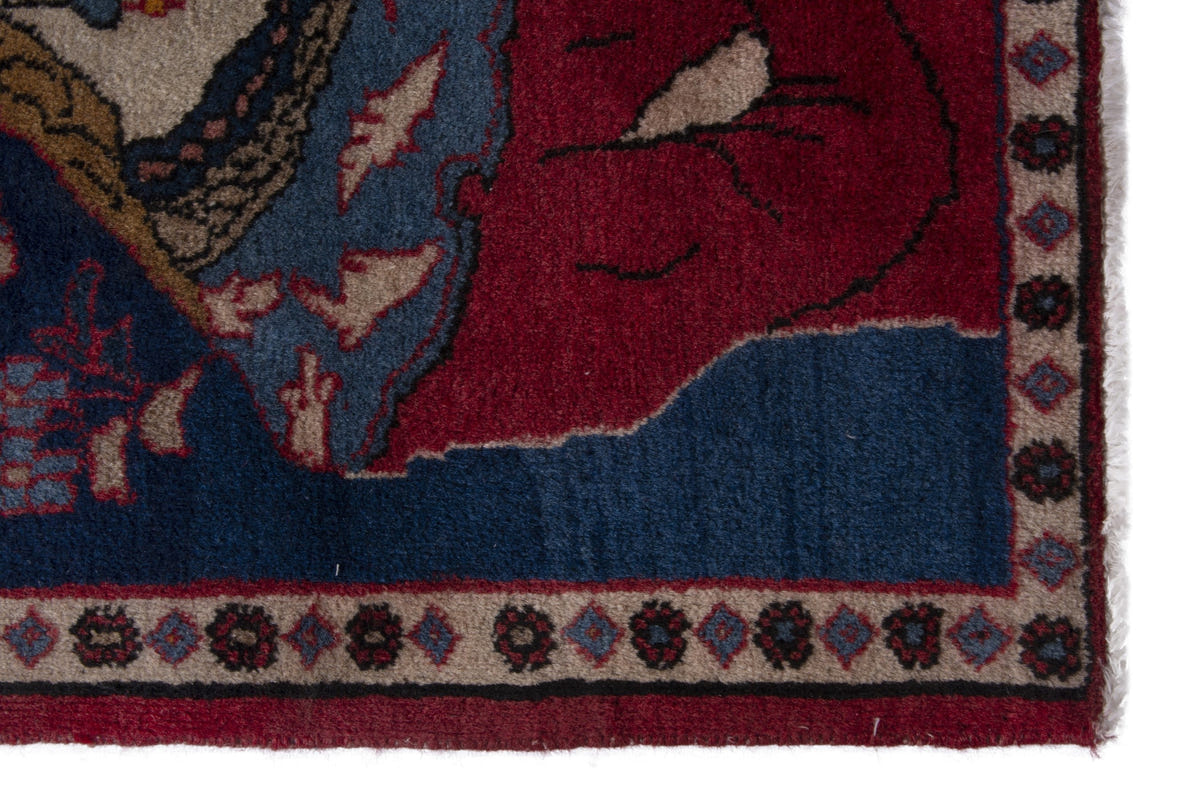 Persian Shahreza accent rug in navy and deep red, view 5 of 10