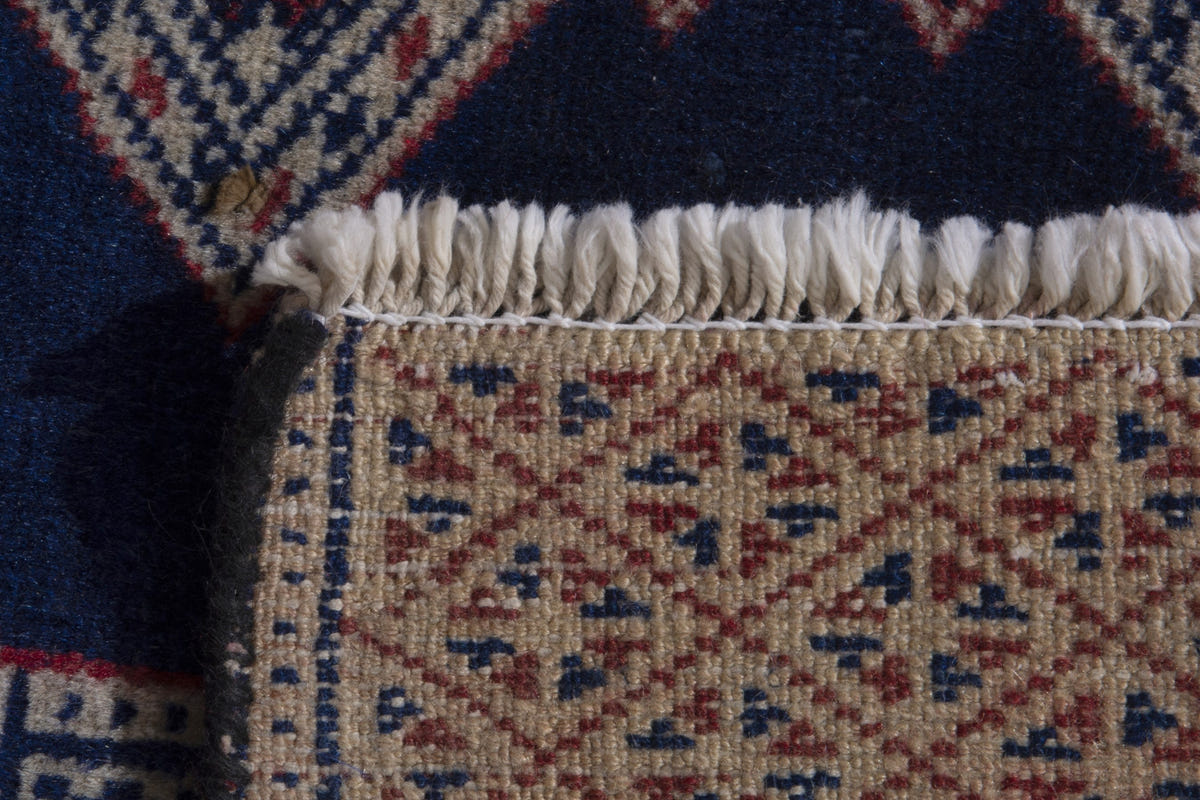 Persian Torkaman accent rug in navy and greige, view 10 of 10