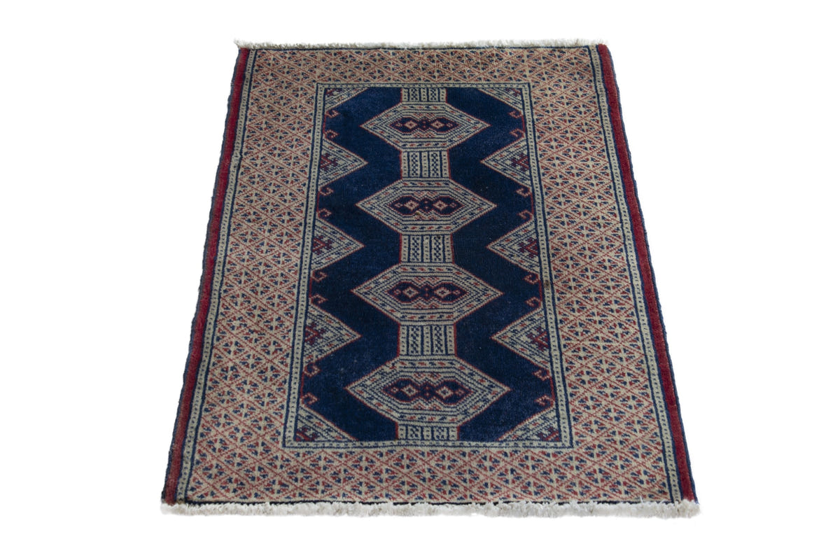 Persian Torkaman accent rug in navy and greige, view 3 of 9
