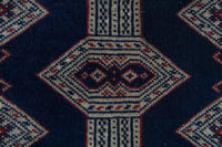 Persian Torkaman accent rug in navy and greige, view 7 of 9