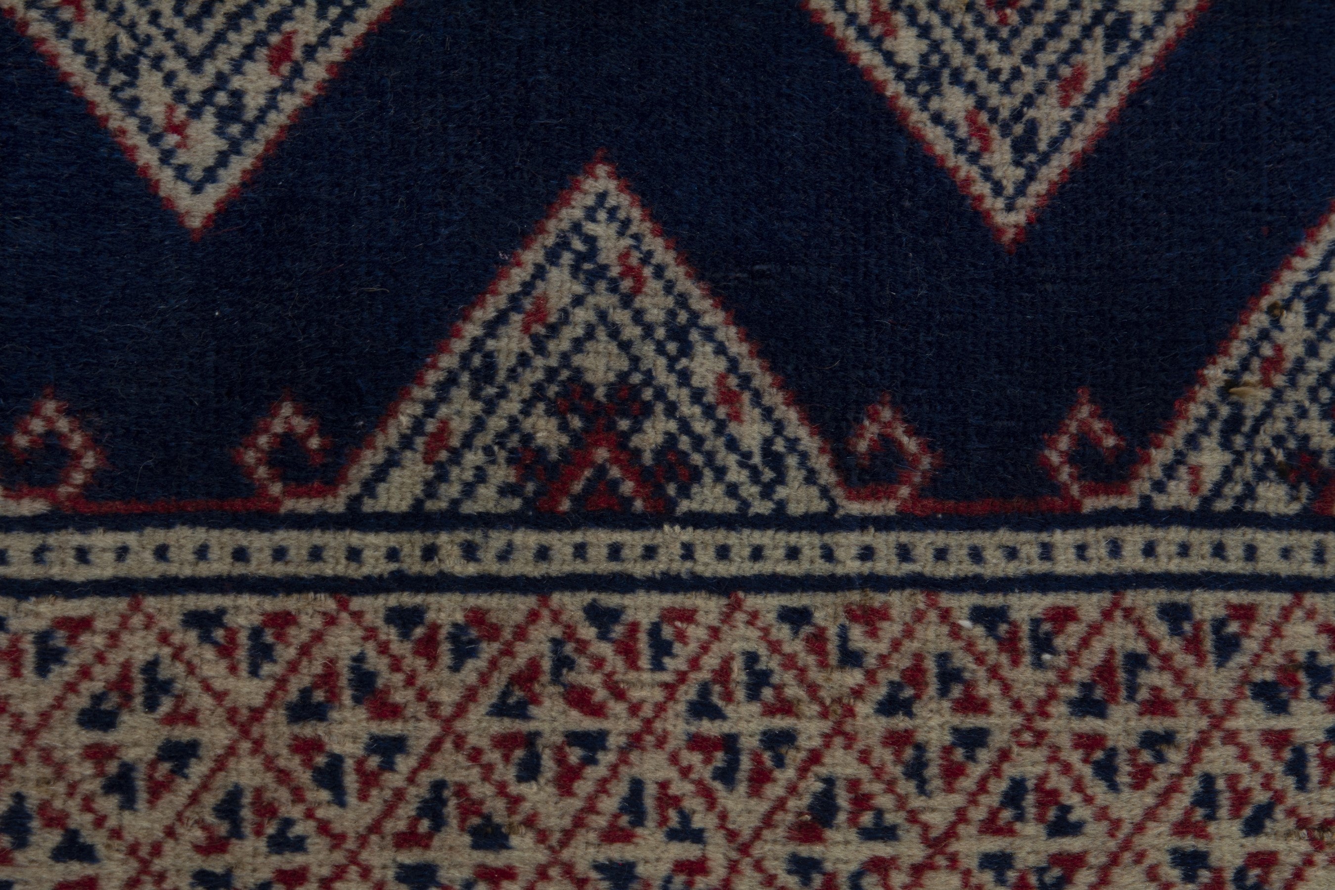 Persian Torkaman accent rug in navy and greige, view 6 of 8