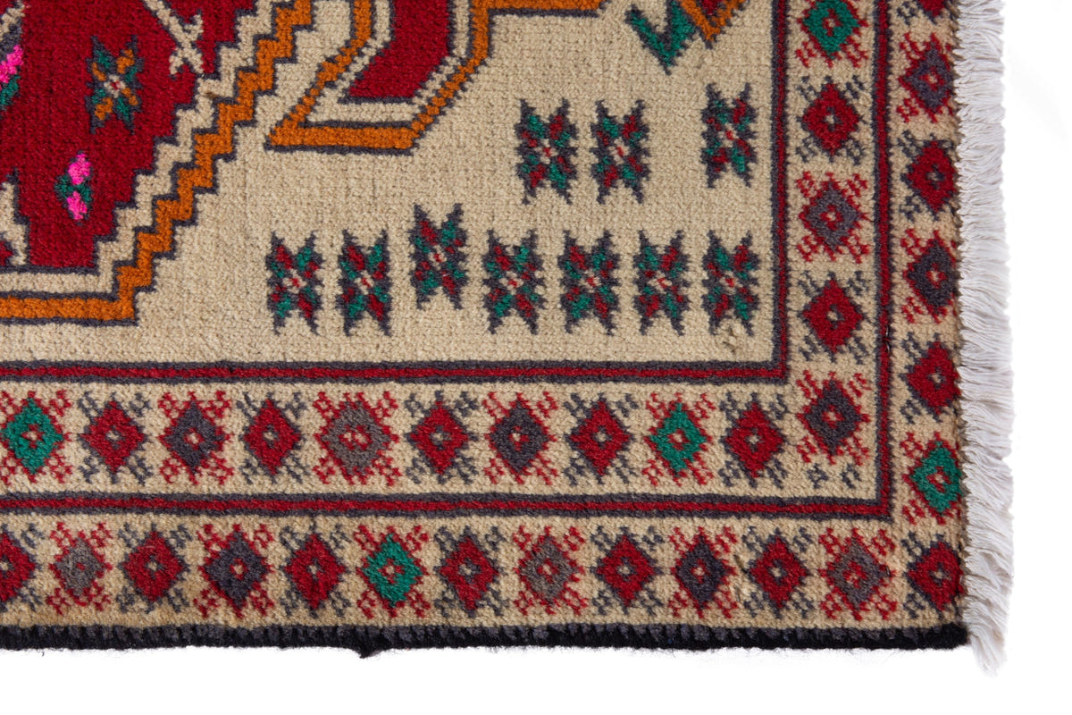 Persian Torkaman accent rug in cream and deep red, view 5 of 9