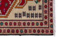 Persian Torkaman accent rug in cream and deep red, view 5 of 9