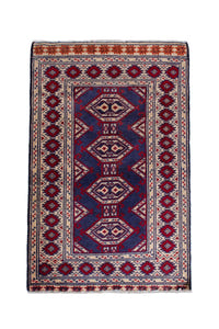 Persian Torkaman accent rug in navy and cream, view 2 of 9