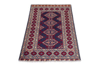 Persian Torkaman accent rug in navy and cream, view 4 of 9