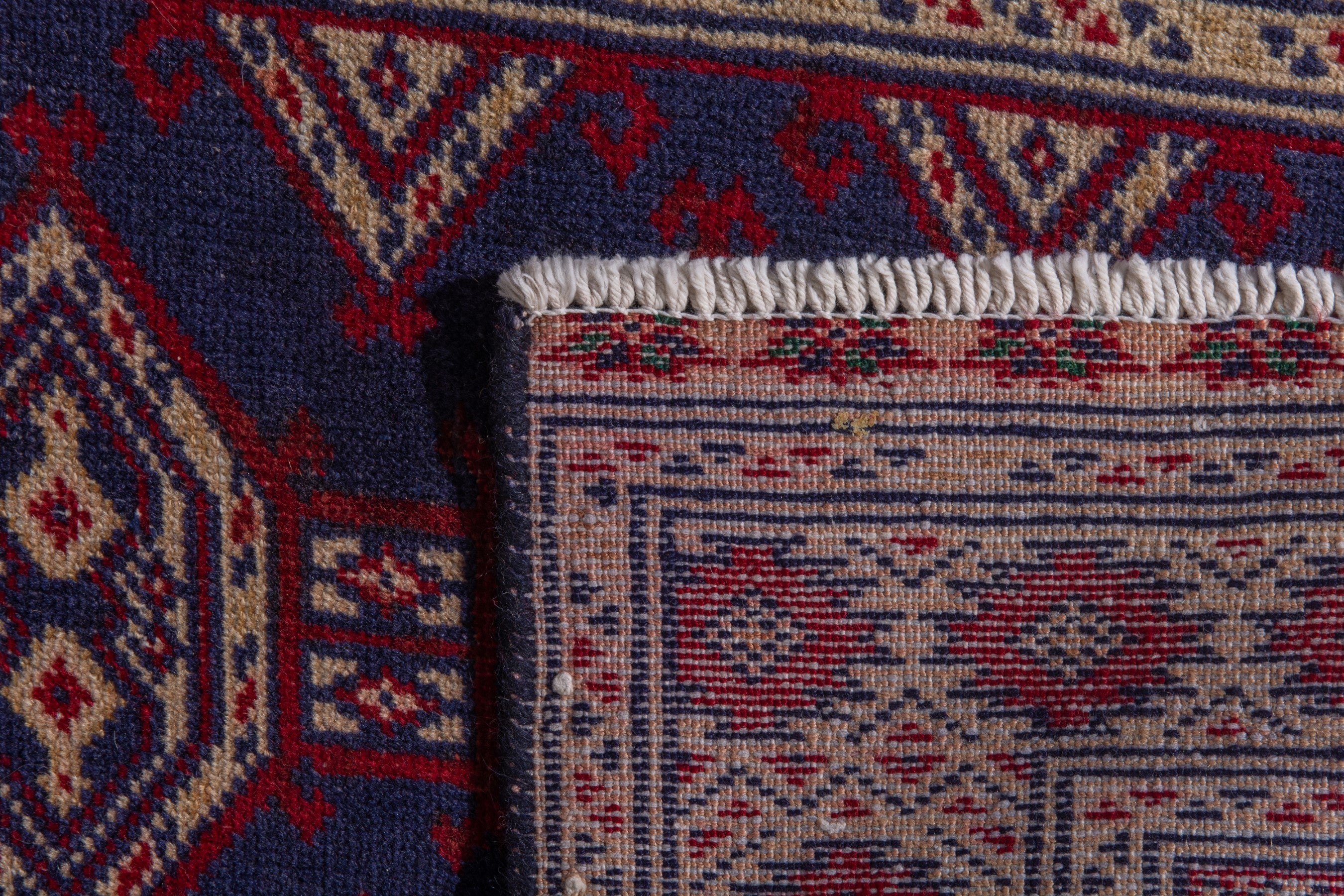 Persian Torkaman accent rug in navy and cream, view 8 of 8