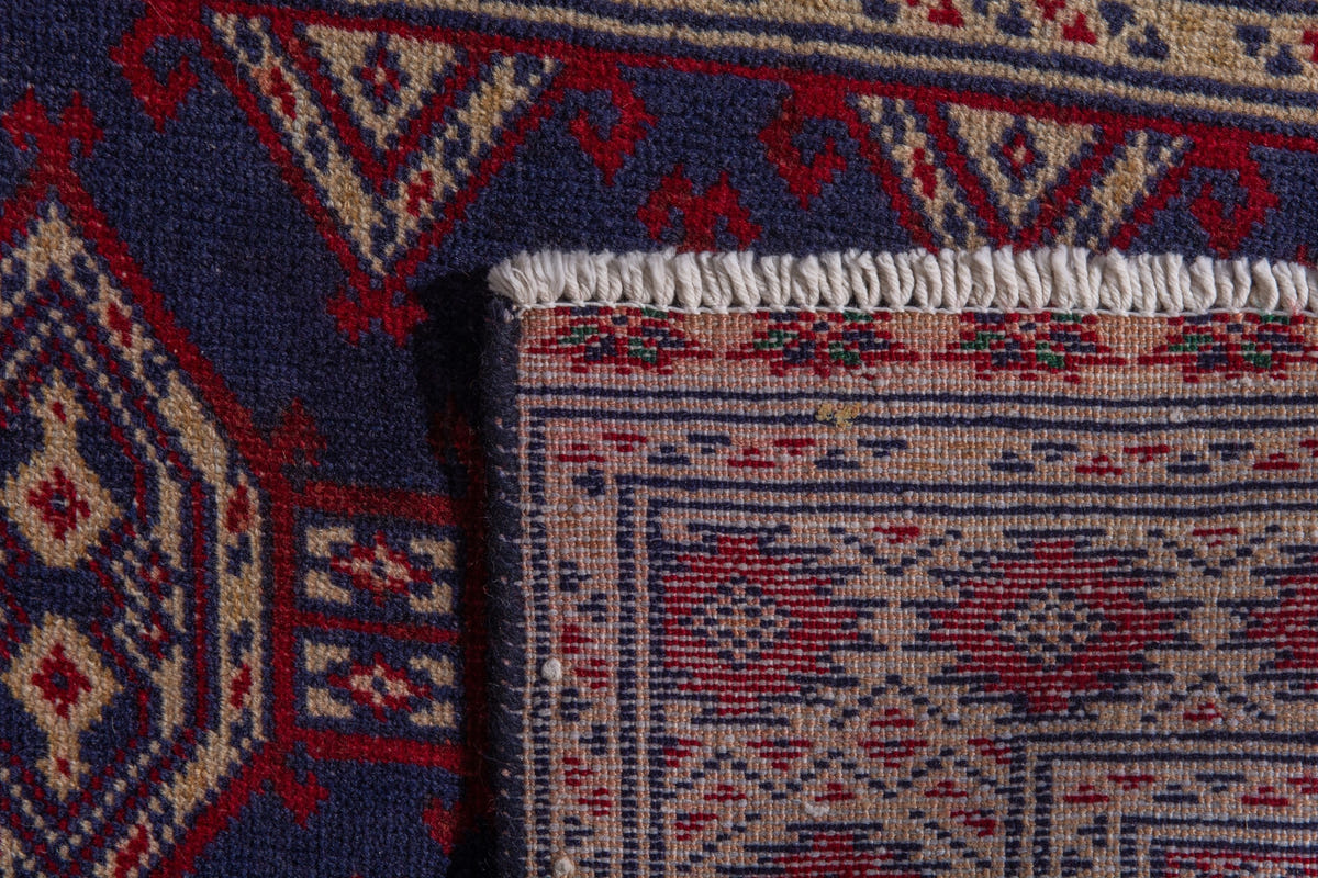 Persian Torkaman accent rug in navy and cream, view 7 of 9