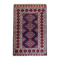 Persian Torkaman accent rug in navy and cream, 2' x 2'11"