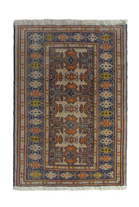 Persian Torkaman accent rug in cream and navy, view 2 of 9