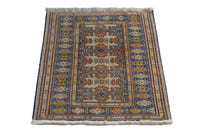 Persian Torkaman accent rug in cream and navy, view 3 of 9